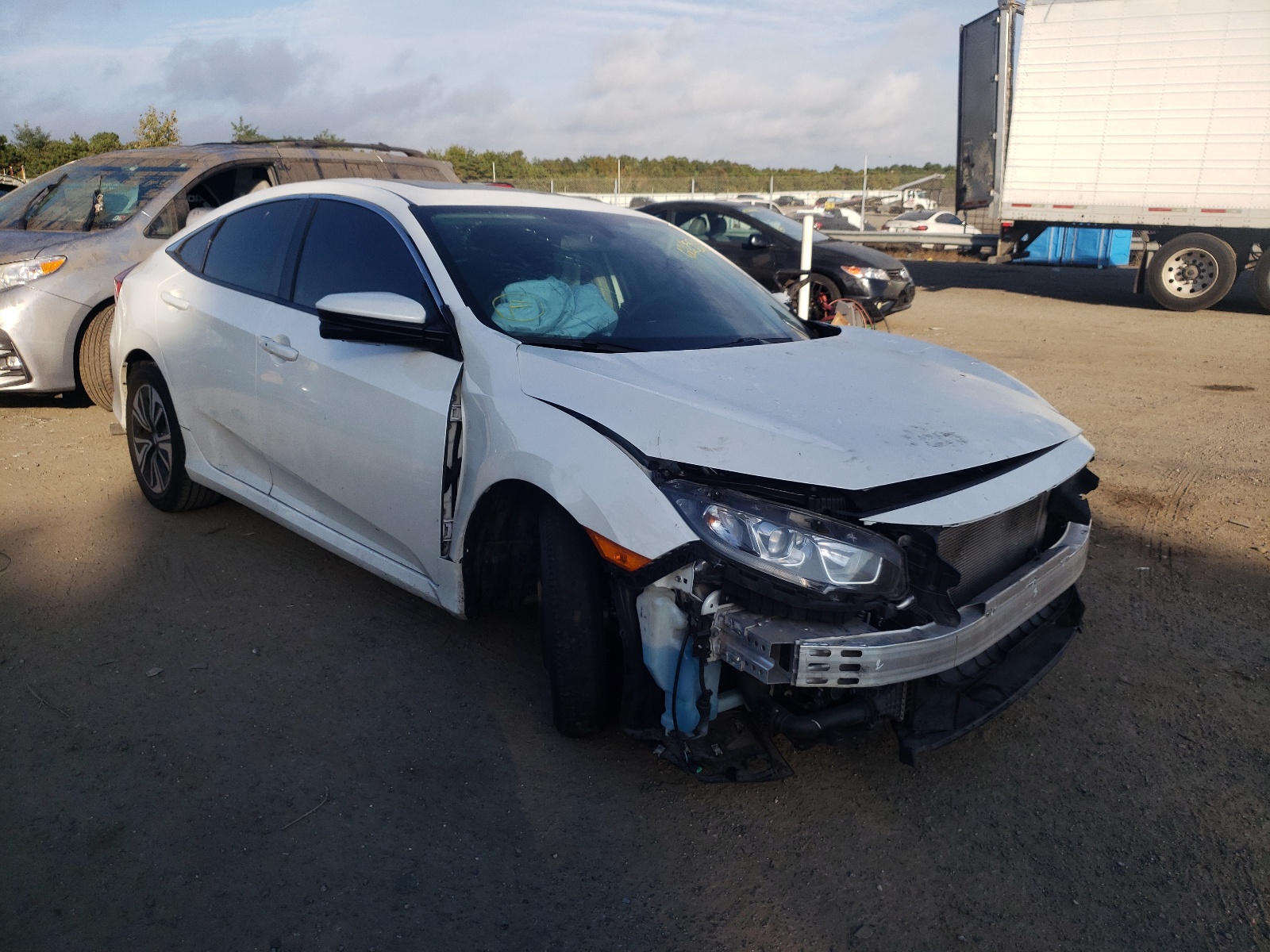 HONDA CIVIC EX 2017 with VIN 19XFC1F38HE207277 - Photo from auction