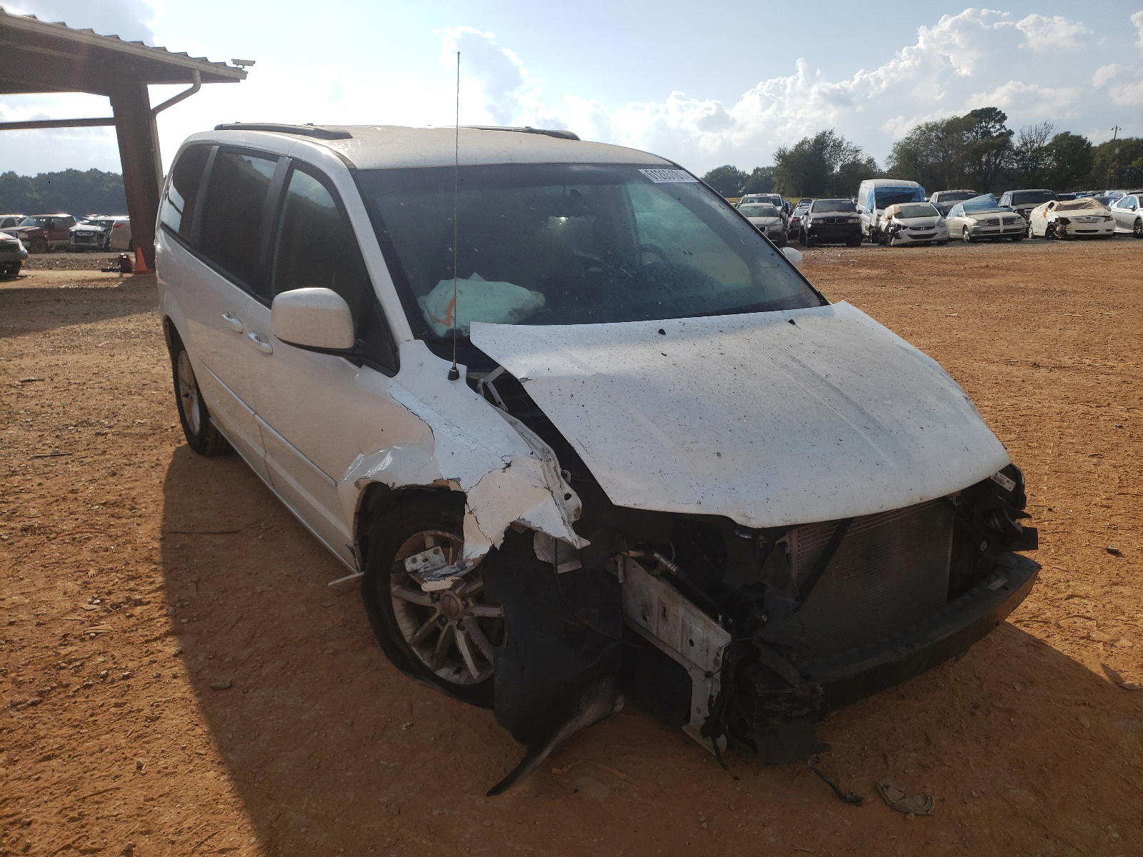 DODGE GRAND CARA 2016 with VIN 2C4RDGCG6GR357728 - Photo from auction
