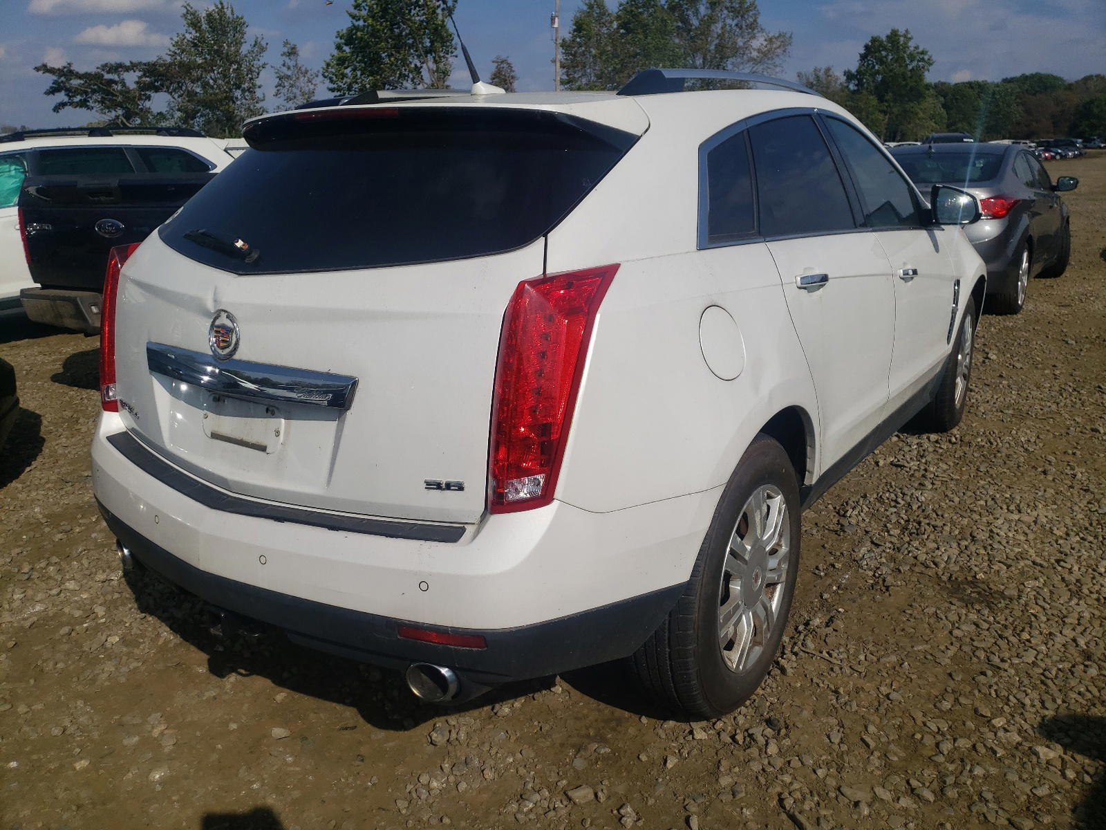 Photo 4 from auction – 2012 CADILLAC SRX LUXURY with VIN 3GYFNDE34CS587817