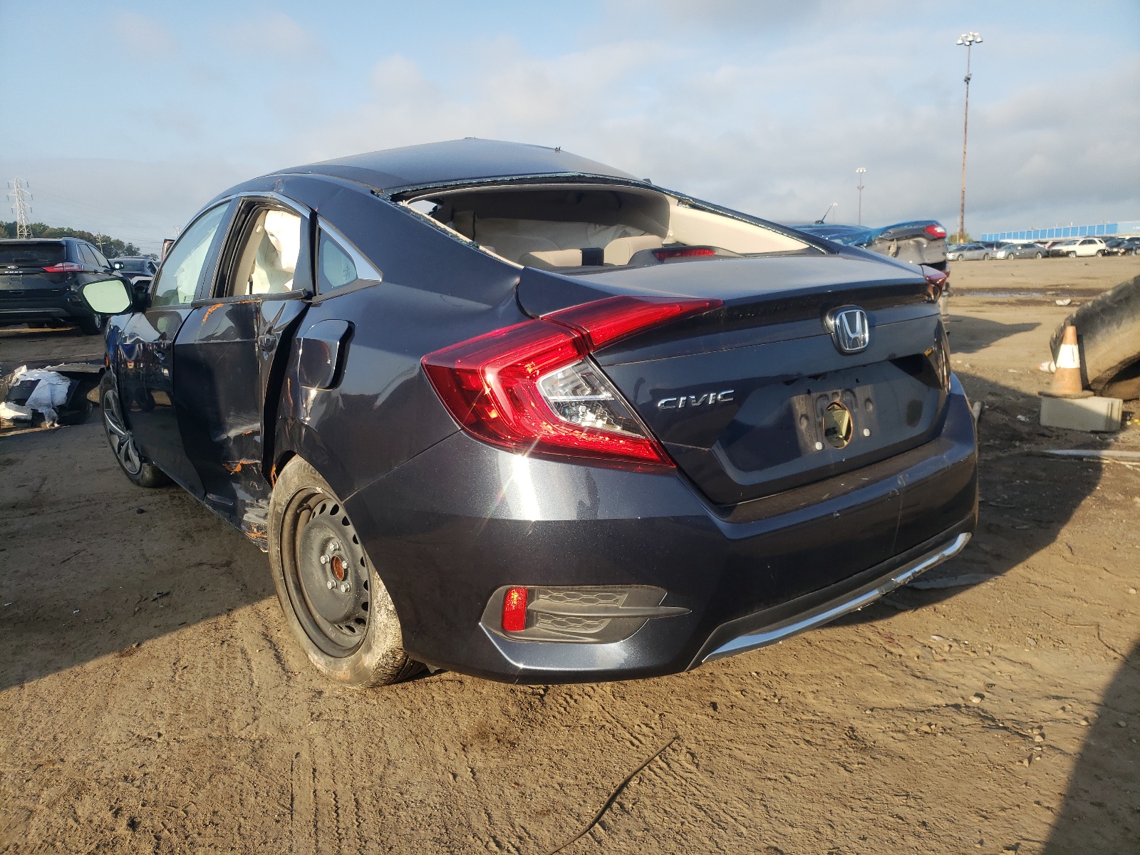 Photo 3 from auction – 2019 HONDA CIVIC LX with VIN 2HGFC2F6XKH553635