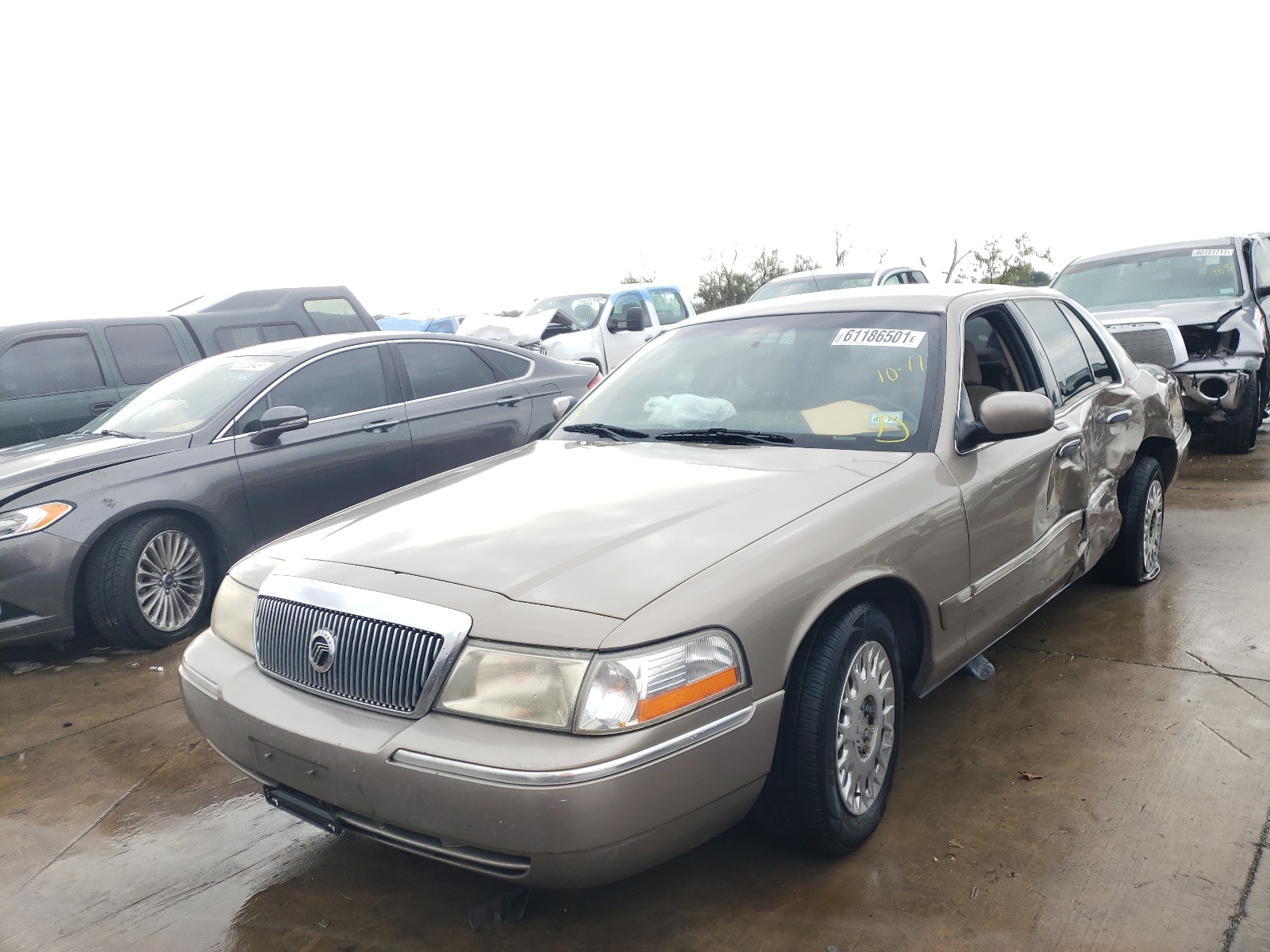 Photo 2 from auction – 2003 MERCURY GRAND MARQ with VIN 2MEFM74W63X618062