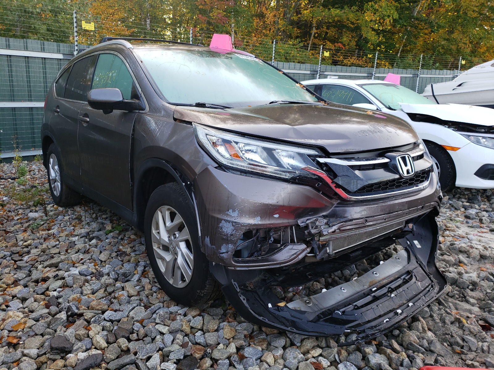 HONDA CR-V EX 2015 with VIN 2HKRM4H57FH696242 - Photo from auction