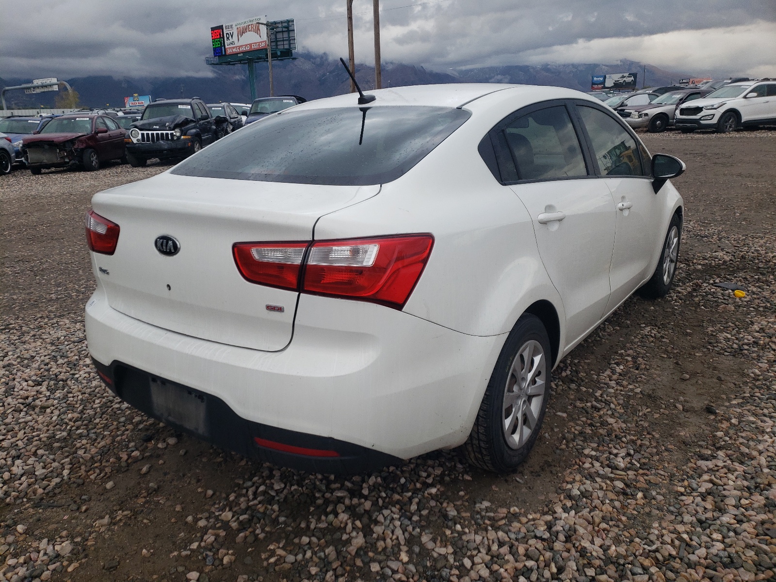 Photo 4 from auction – 2013 KIA RIO LX with VIN KNADM4A31D6144436