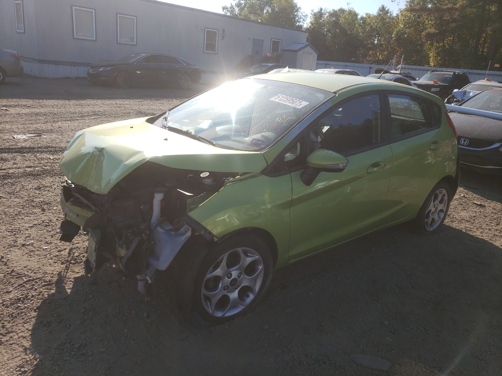 Photo 2 from auction – 2011 FORD FIESTA SES with VIN 3FADP4FJ7BM131324