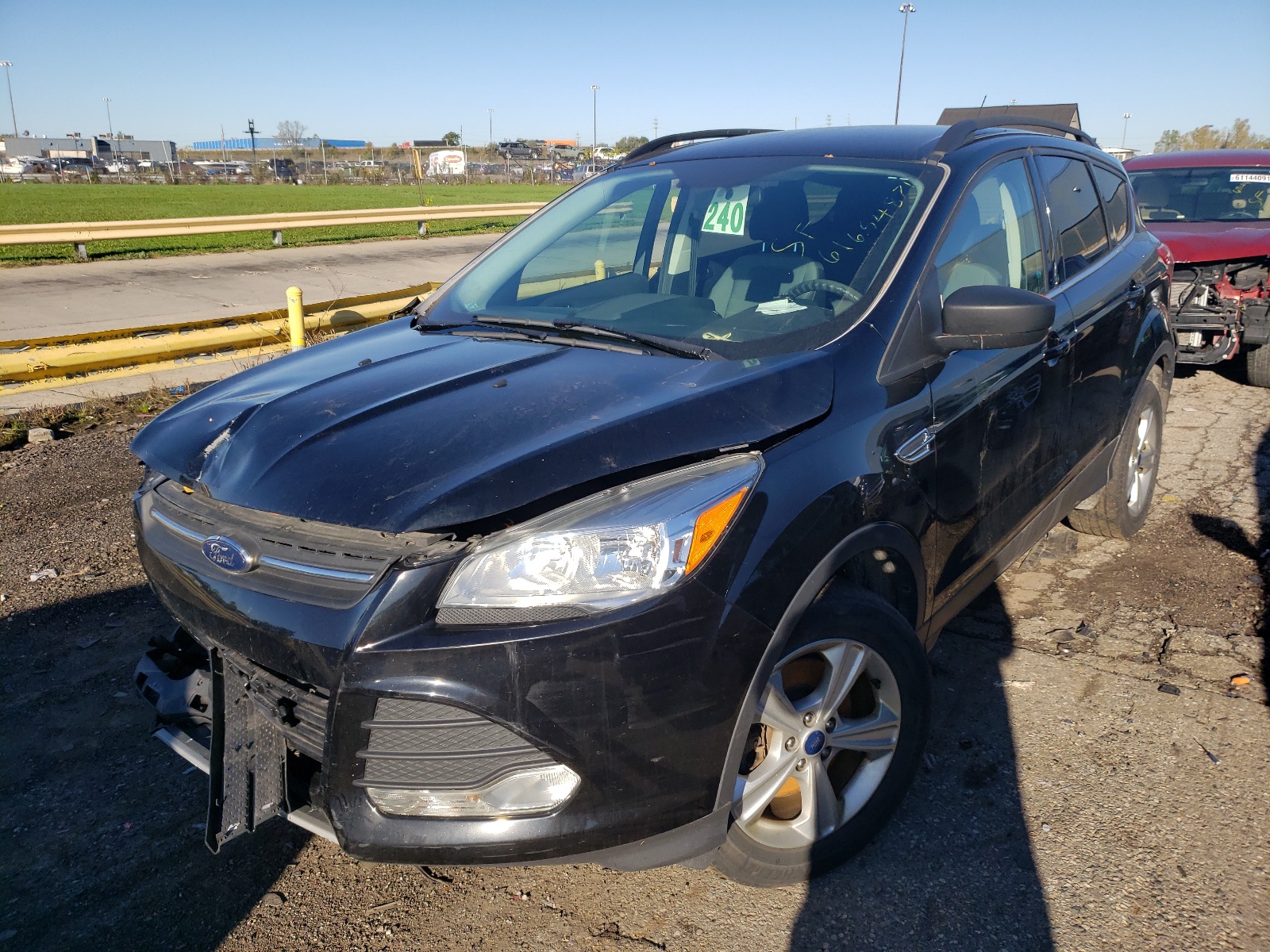 Photo 2 from auction – 2016 FORD ESCAPE SE with VIN 1FMCU9GX1GUC24658