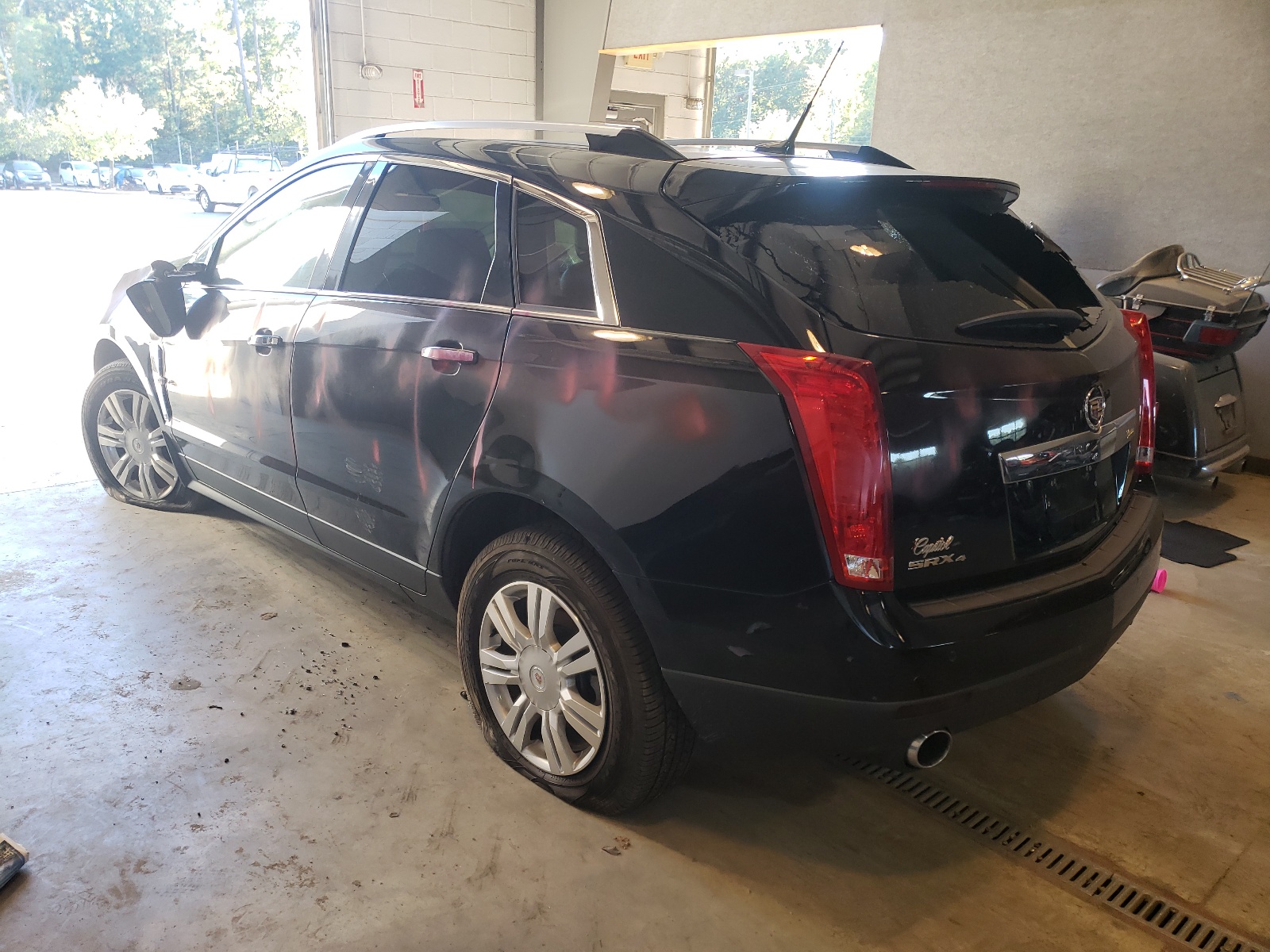 Photo 3 from auction – 2011 CADILLAC SRX LUXURY with VIN 3GYFNDEYXBS532671