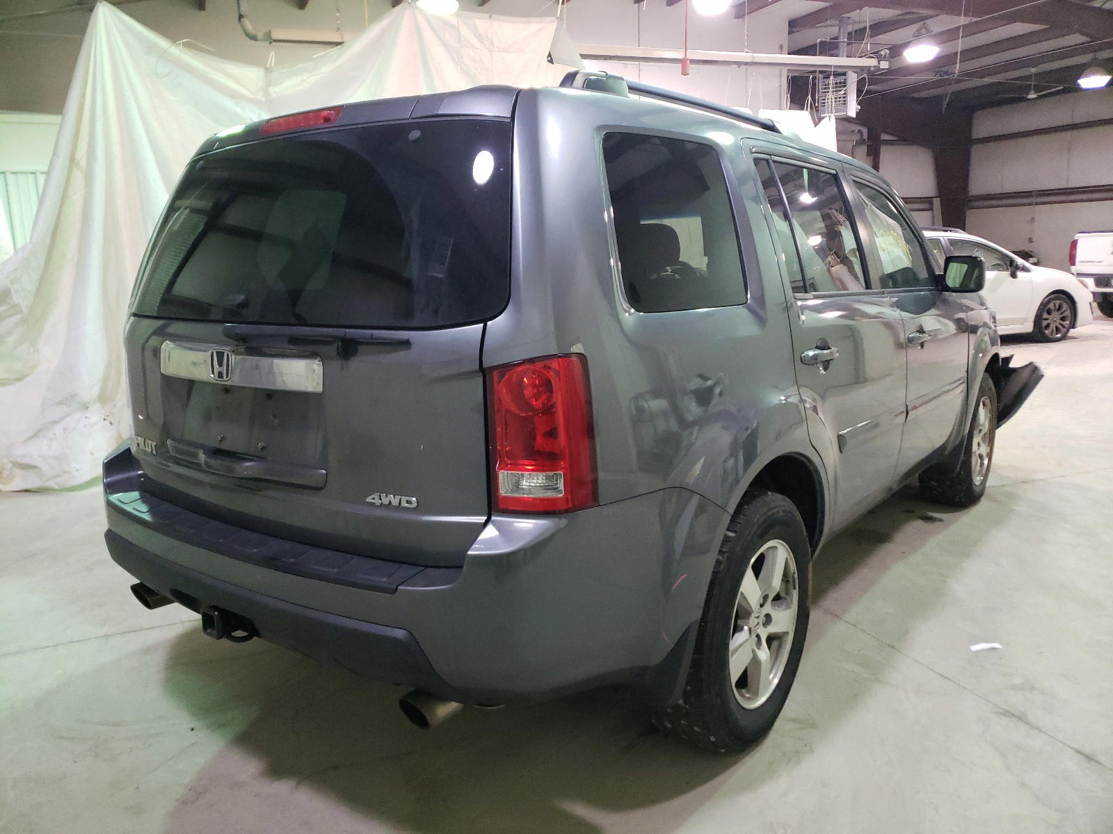 Photo 4 from auction – 2011 HONDA PILOT EX with VIN 5FNYF4H43BB102560
