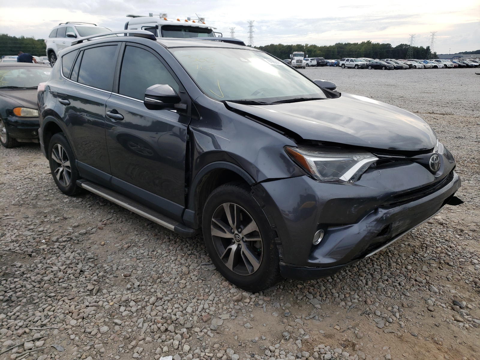 TOYOTA RAV4 XLE 2017 with VIN JTMWFREV2HD097482 - Photo from auction
