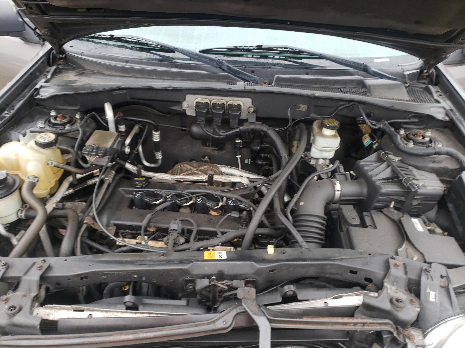 Photo 7 from auction – 2005 MAZDA TRIBUTE I with VIN 4F2YZ02Z25KM63175