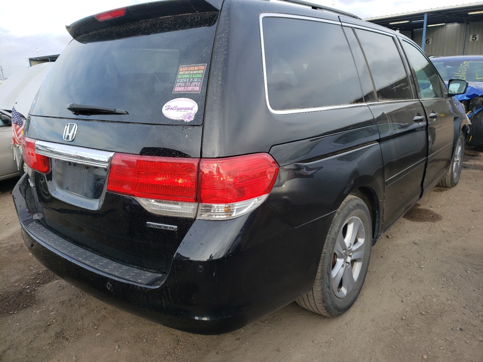 Photo 4 from auction – 2010 HONDA ODYSSEY TO with VIN 5FNRL3H92AB092203