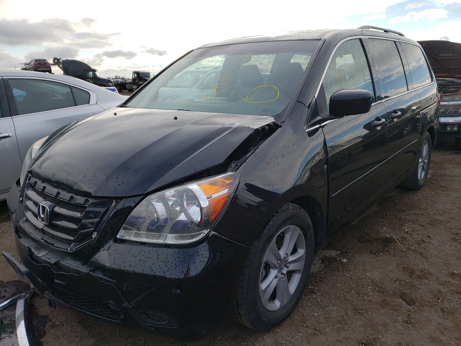 Photo 2 from auction – 2010 HONDA ODYSSEY TO with VIN 5FNRL3H92AB092203