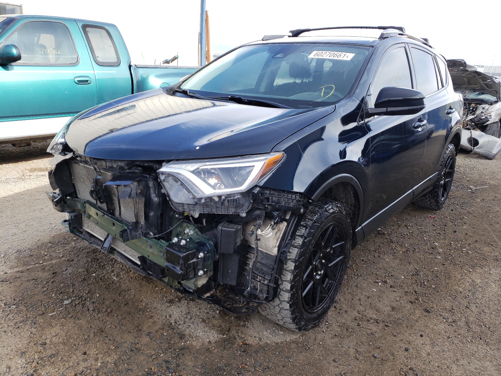 Photo 2 from auction – 2017 TOYOTA RAV4 LE with VIN 2T3BFREV8HW577527
