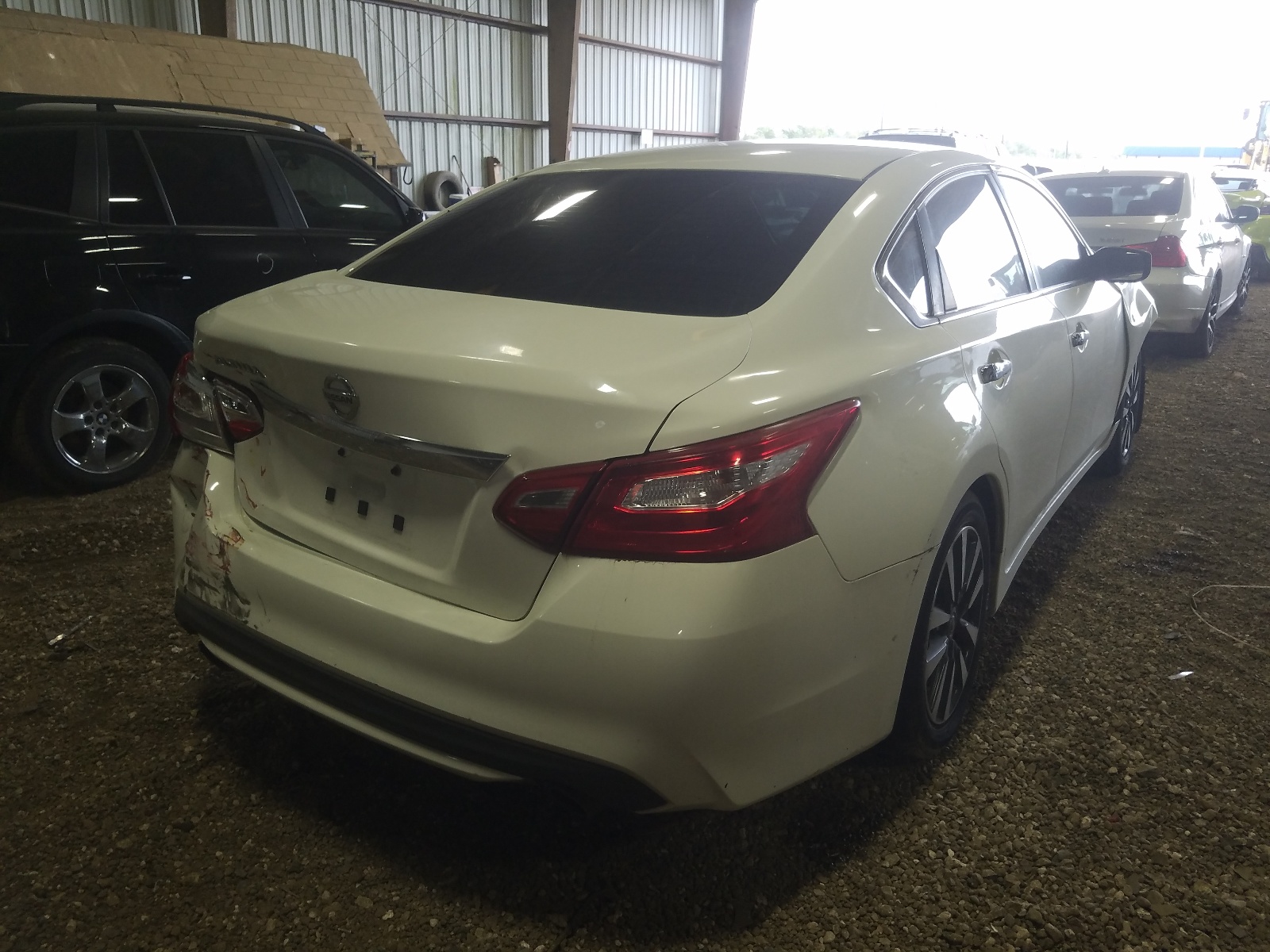 Photo 4 from auction – 2016 NISSAN ALTIMA 2.5 with VIN 1N4AL3AP1GC211957