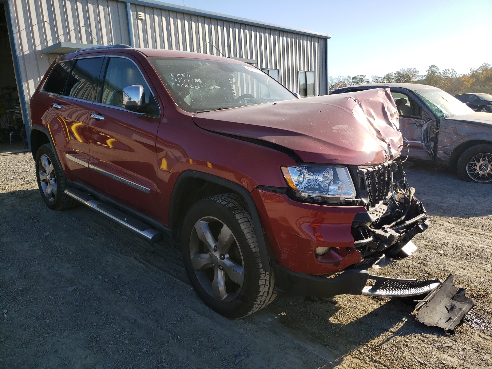 JEEP GRAND CHER 2011 with VIN 1J4RR6GT8BC573966 - Photo from auction