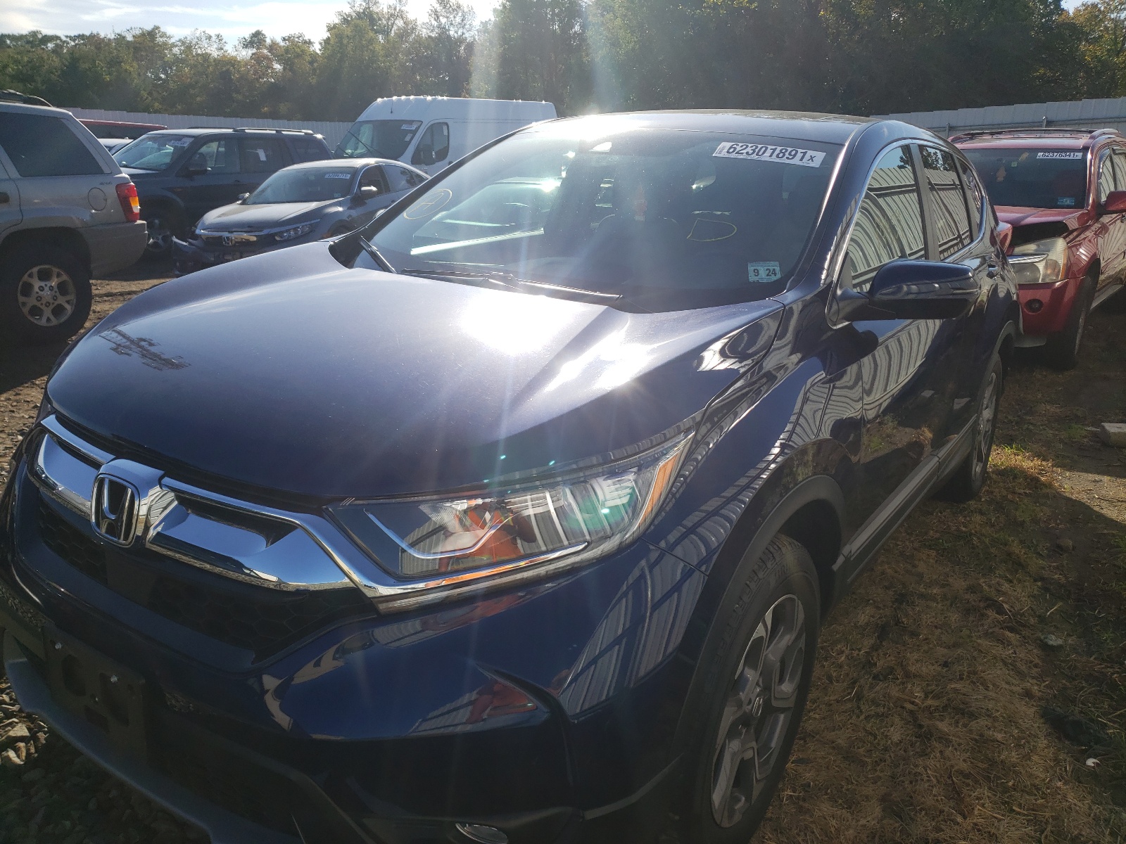 Photo 2 from auction – 2019 HONDA CR-V EX with VIN 7FARW2H54KE045095