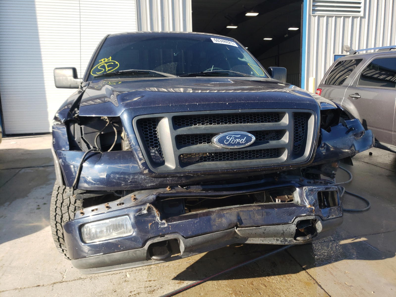 Photo 9 from auction – 2004 FORD F150 with VIN 1FTRF14574NA69651