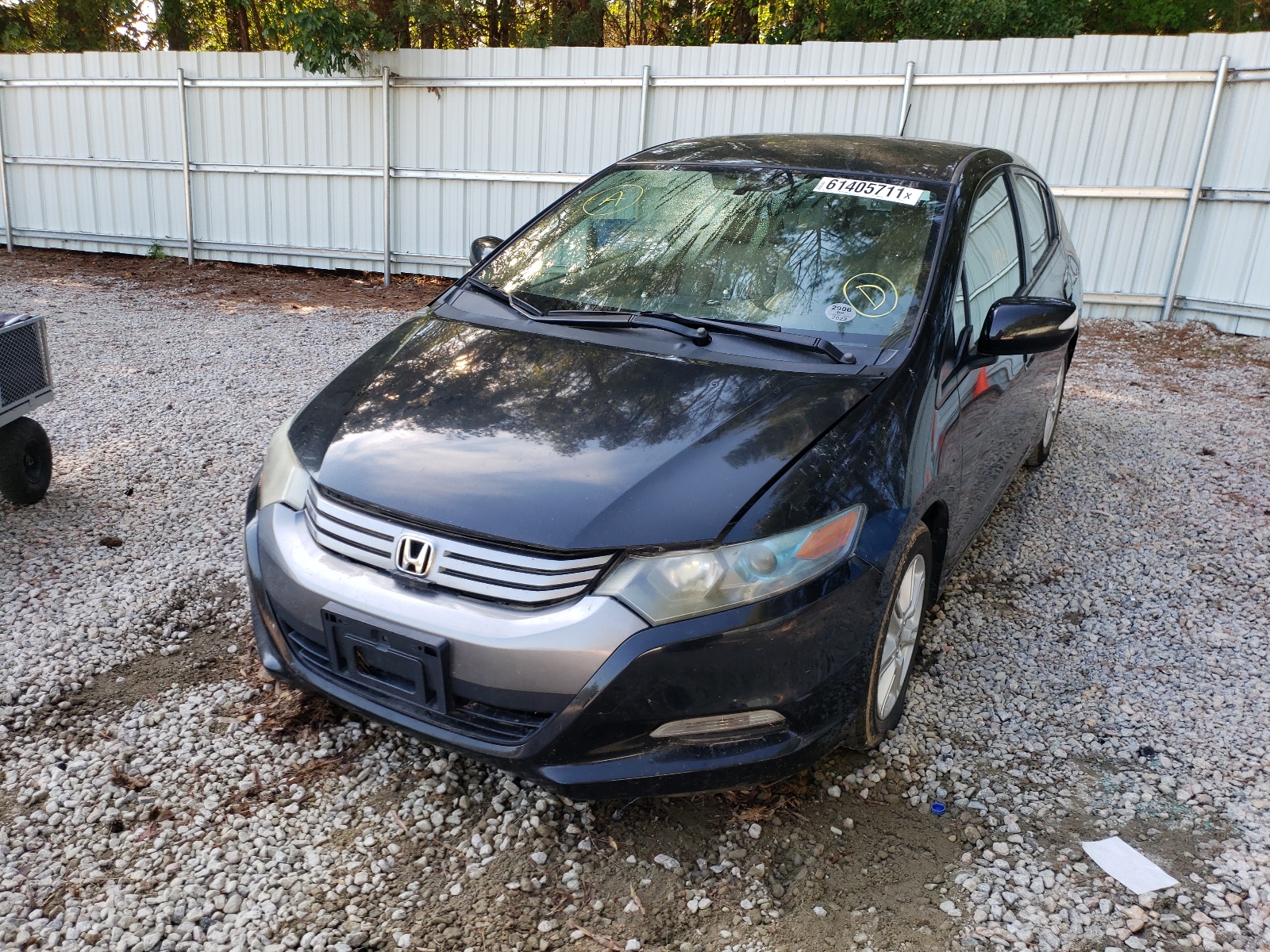 Photo 9 from auction – 2010 HONDA INSIGHT EX with VIN JHMZE2H7XAS041133
