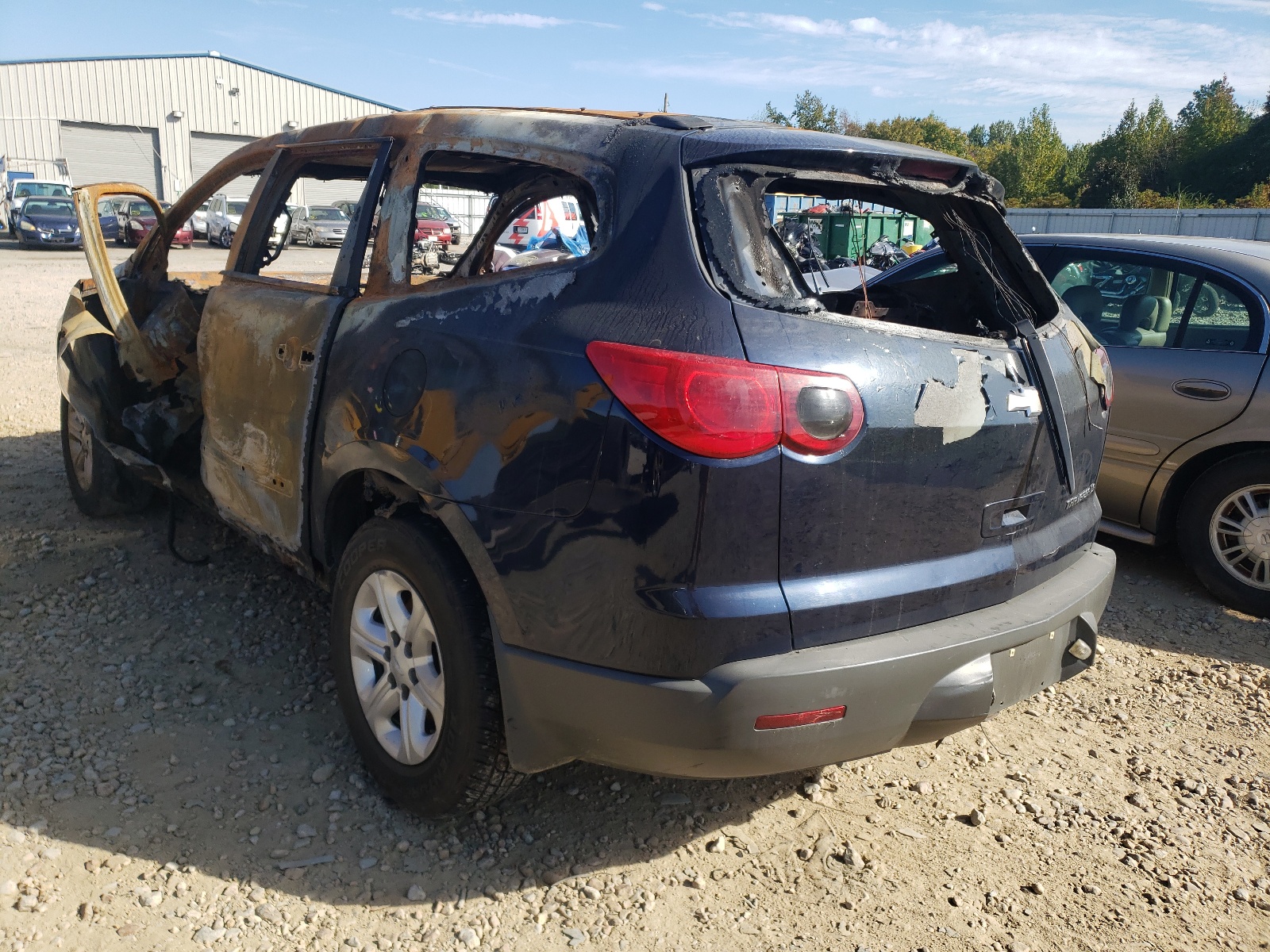 Photo 3 from auction – 2010 CHEVROLET TRAVERSE L with VIN 1GNLREED6AS122418