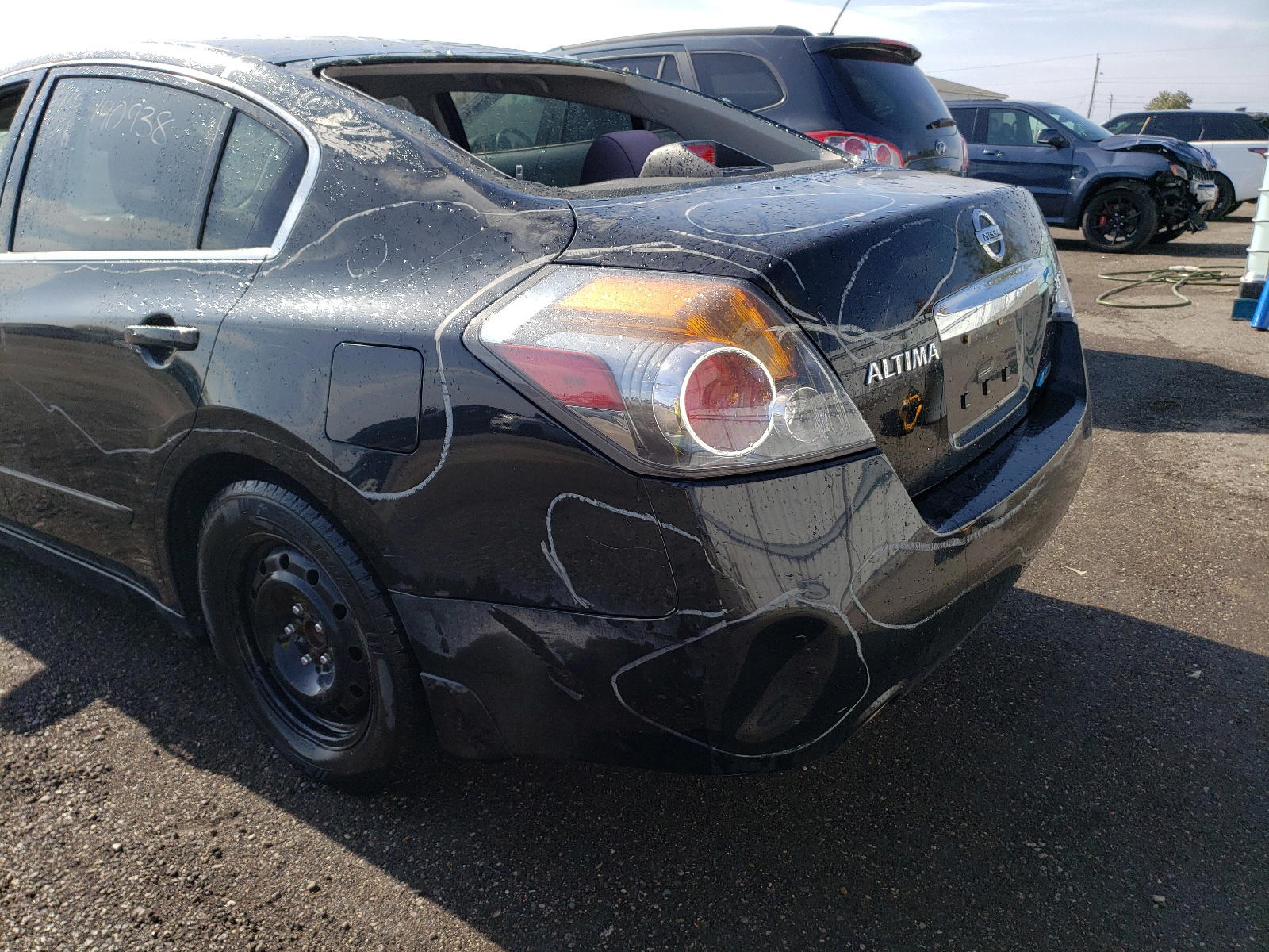 Photo 9 from auction – 2011 NISSAN ALTIMA SR with VIN 1N4BL2AP0BC166937