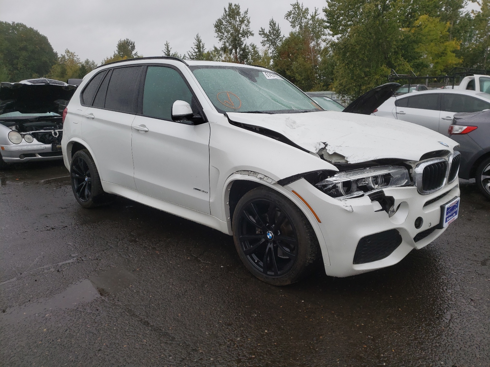 BMW X5 XDRIVE3 2014 with VIN 5UXKR0C56E0K47373 - Photo from auction
