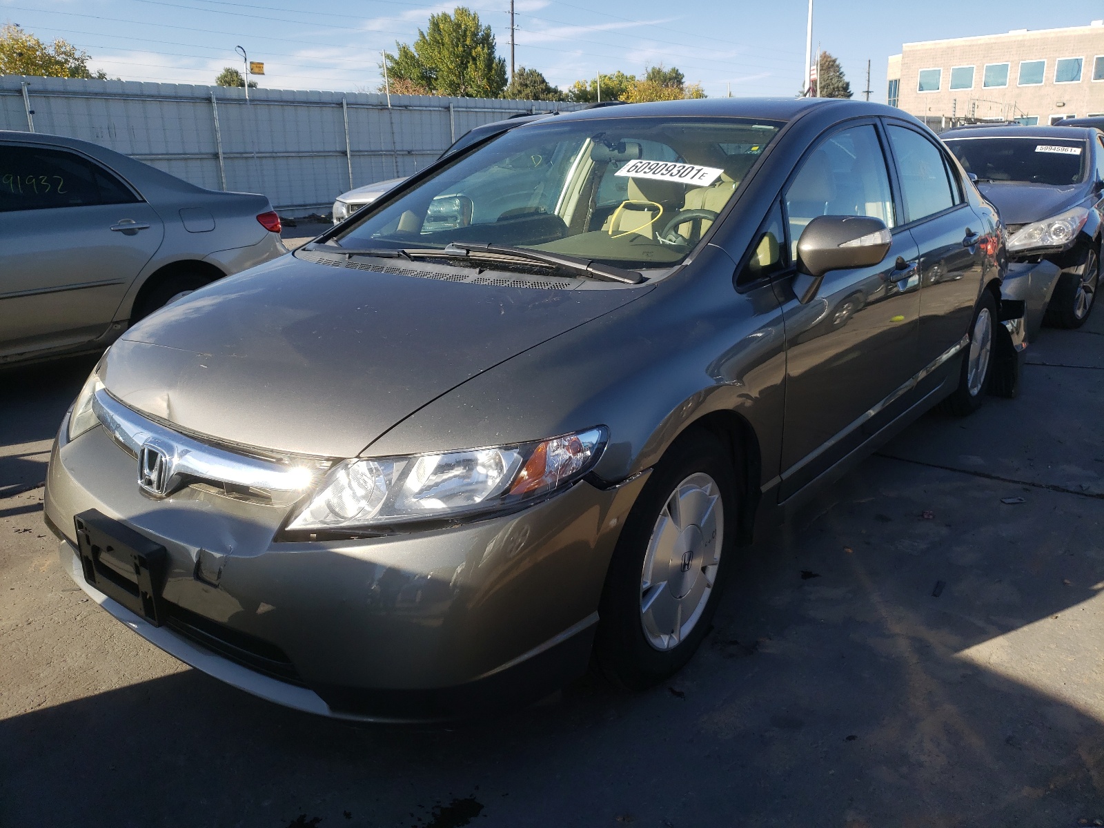 Photo 2 from auction – 2006 HONDA CIVIC HYBR with VIN JHMFA36236S011829