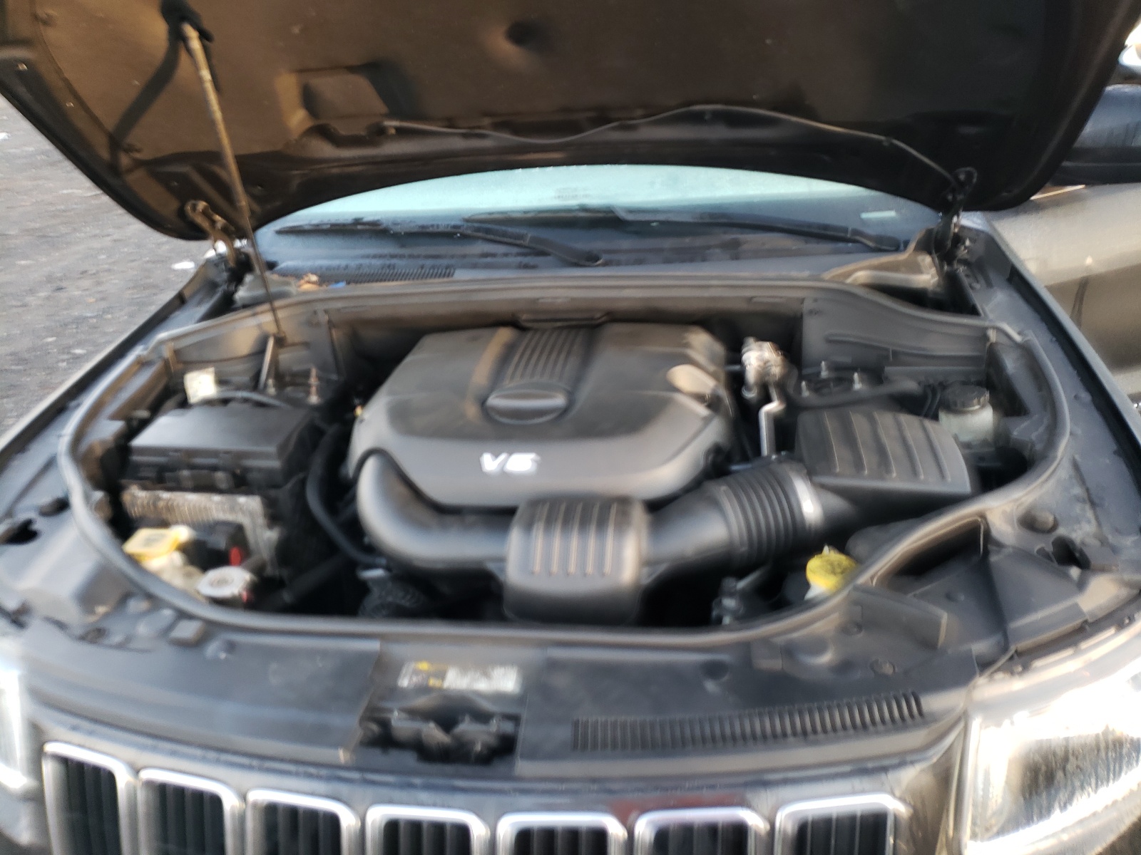 Photo 7 from auction – 2014 JEEP GRAND CHER with VIN 1C4RJFAG4EC372126