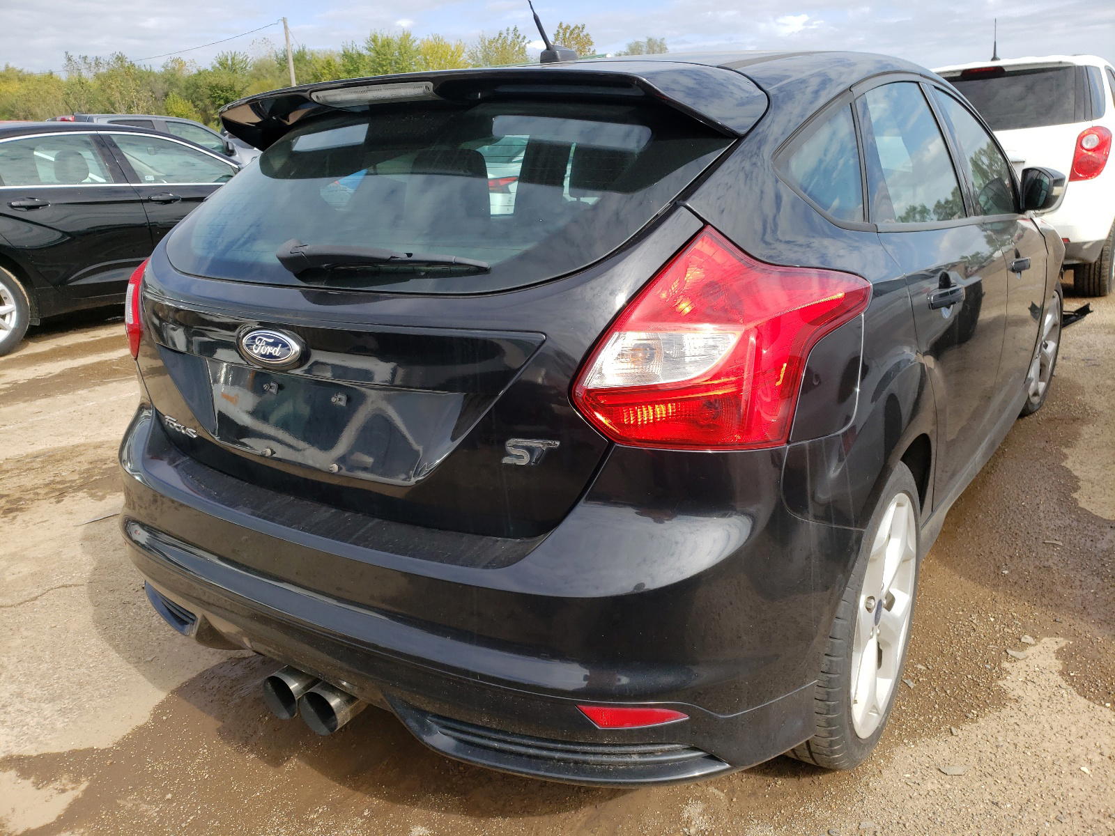 Photo 4 from auction – 2013 FORD FOCUS with VIN 1FADP3L90DL301113