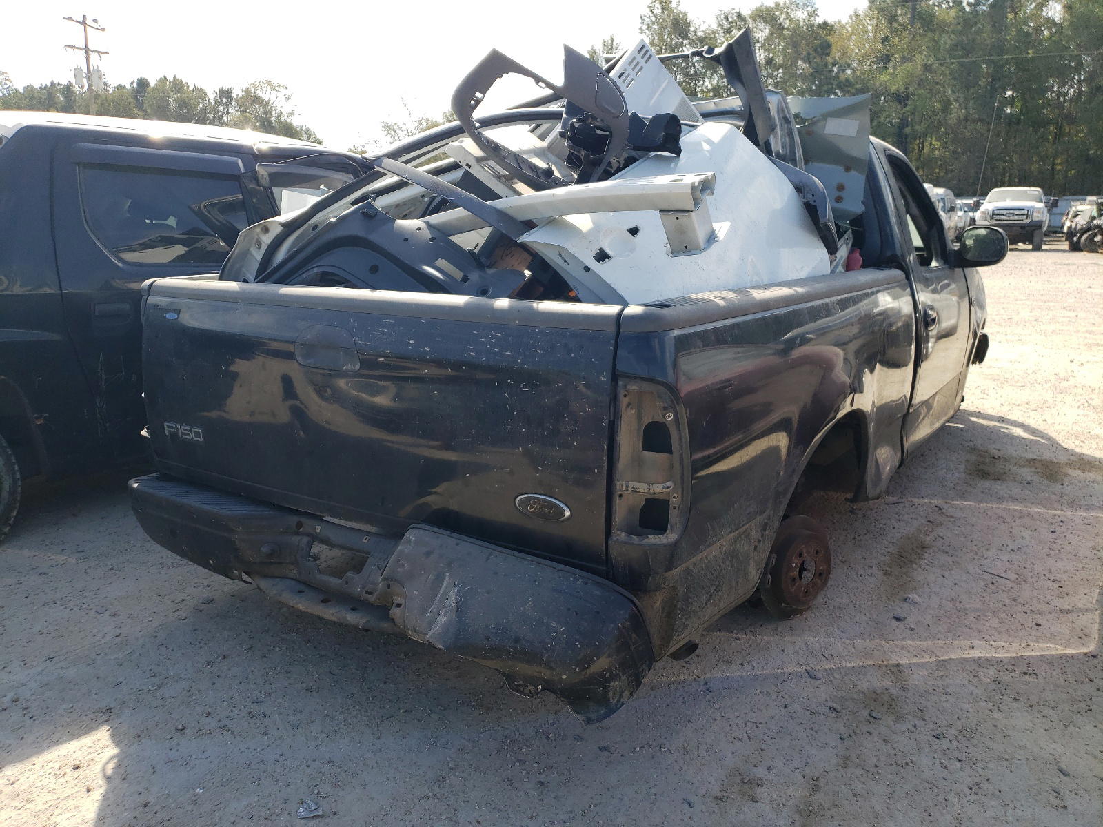 Photo 4 from auction – 2003 FORD F150 with VIN 1FTRF17273NA61985