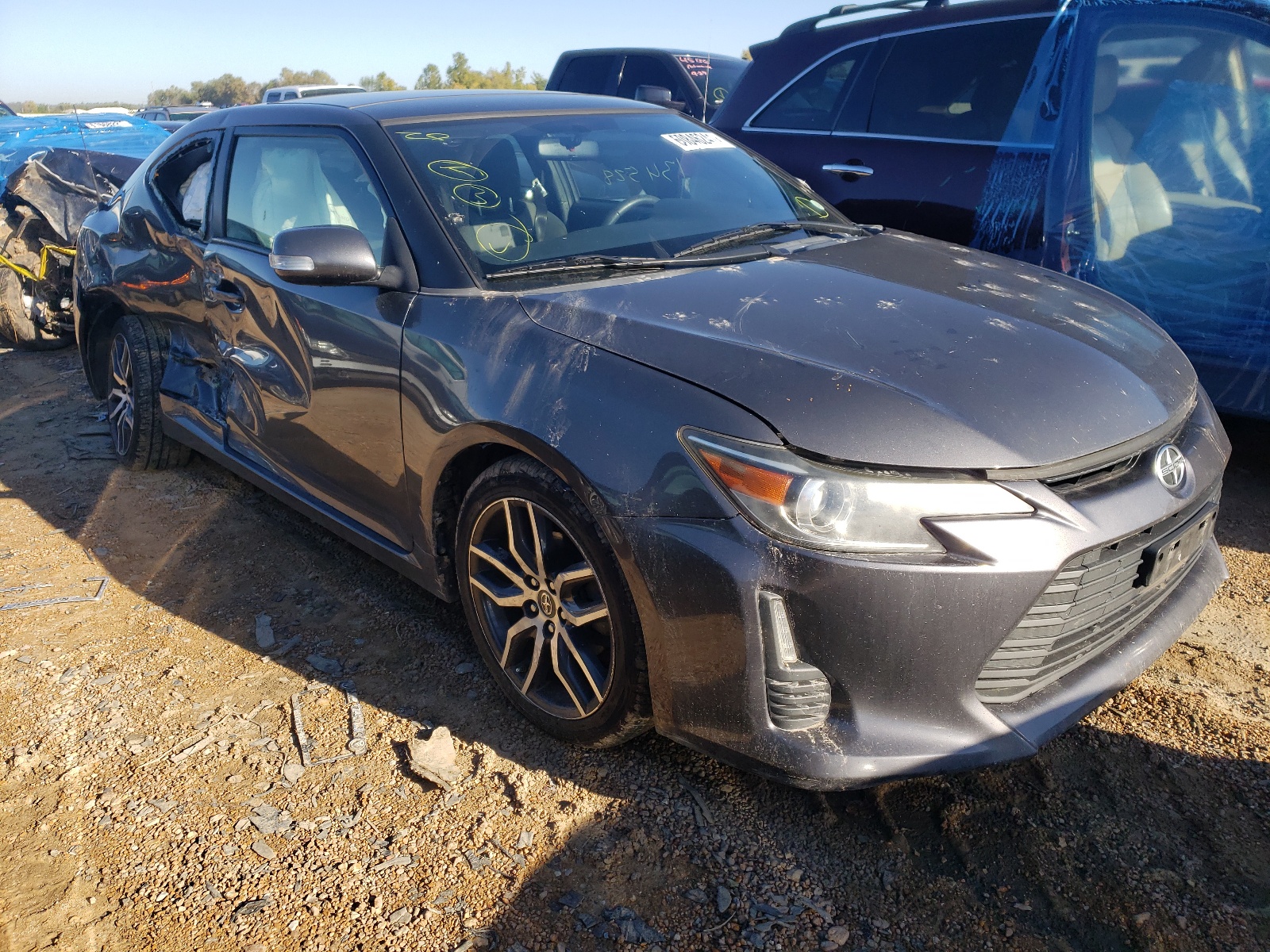TOYOTA SCION TC 2015 with VIN JTKJF5C78FJ003975 - Photo from auction