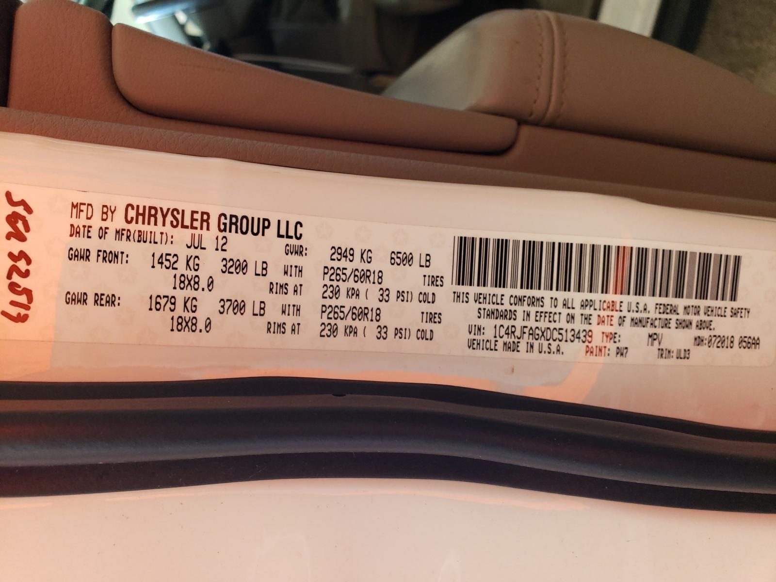 Photo 10 from auction – 2013 JEEP GRAND CHER with VIN 1C4RJFAGXDC513439