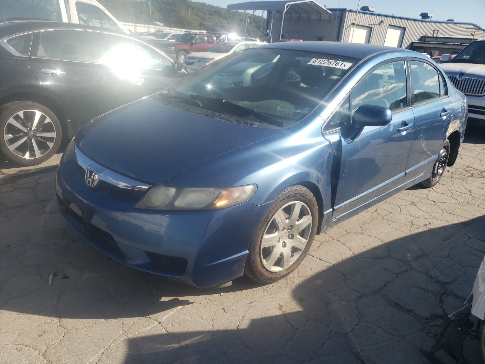 Photo 2 from auction – 2011 HONDA CIVIC LX with VIN 2HGFA1F55BH537222