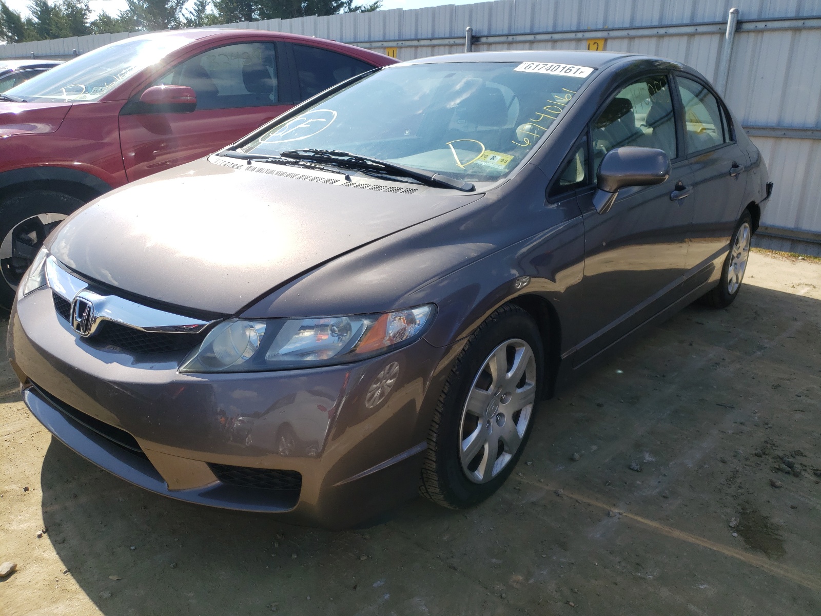 Photo 2 from auction – 2011 HONDA CIVIC LX with VIN 2HGFA1F59BH545792