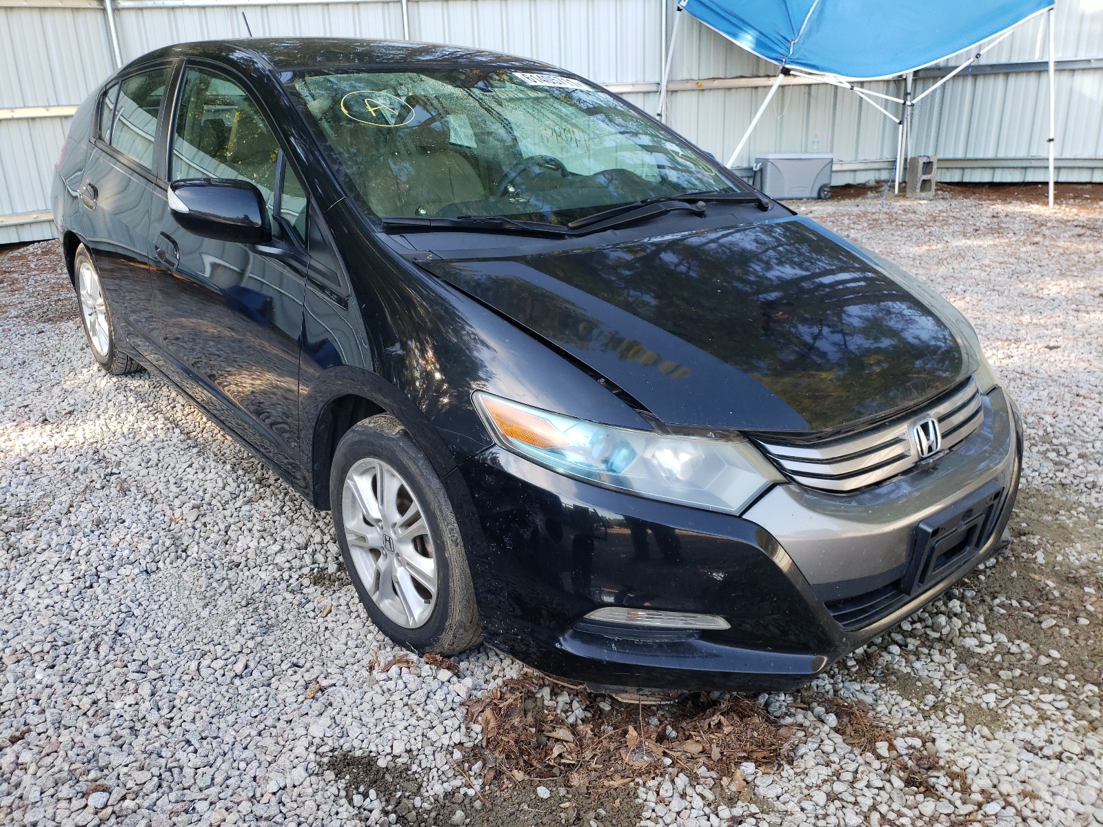 HONDA INSIGHT EX 2010 with VIN JHMZE2H7XAS041133 - Photo from auction