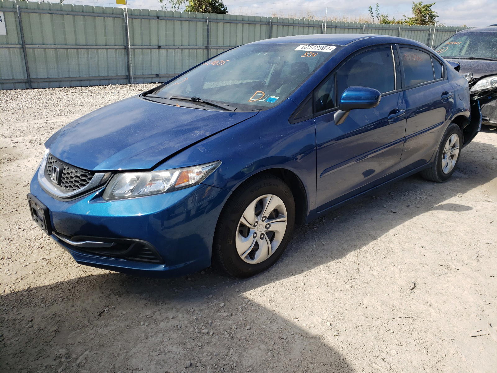 Photo 2 from auction – 2014 HONDA CIVIC LX with VIN 19XFB2F53EE270695