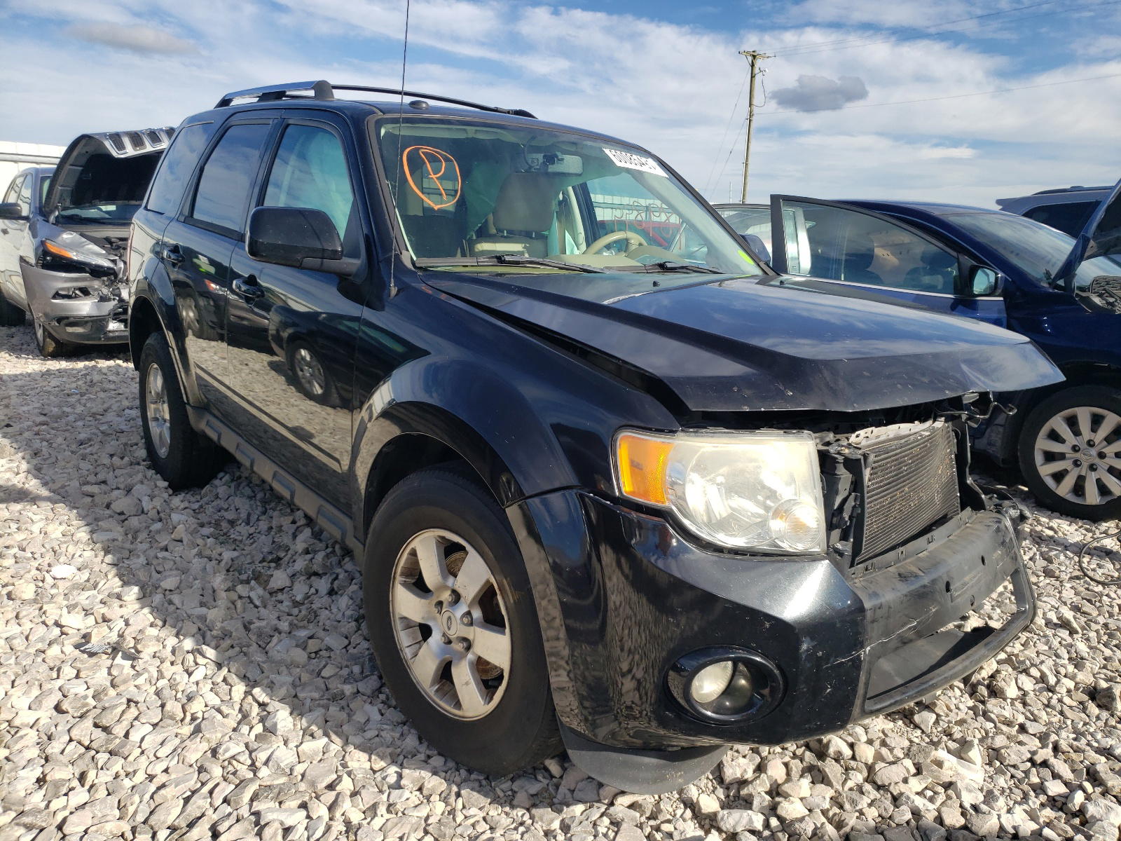 FORD ESCAPE LIM 2011 with VIN 1FMCU9EG5BKA75078 - Photo from auction