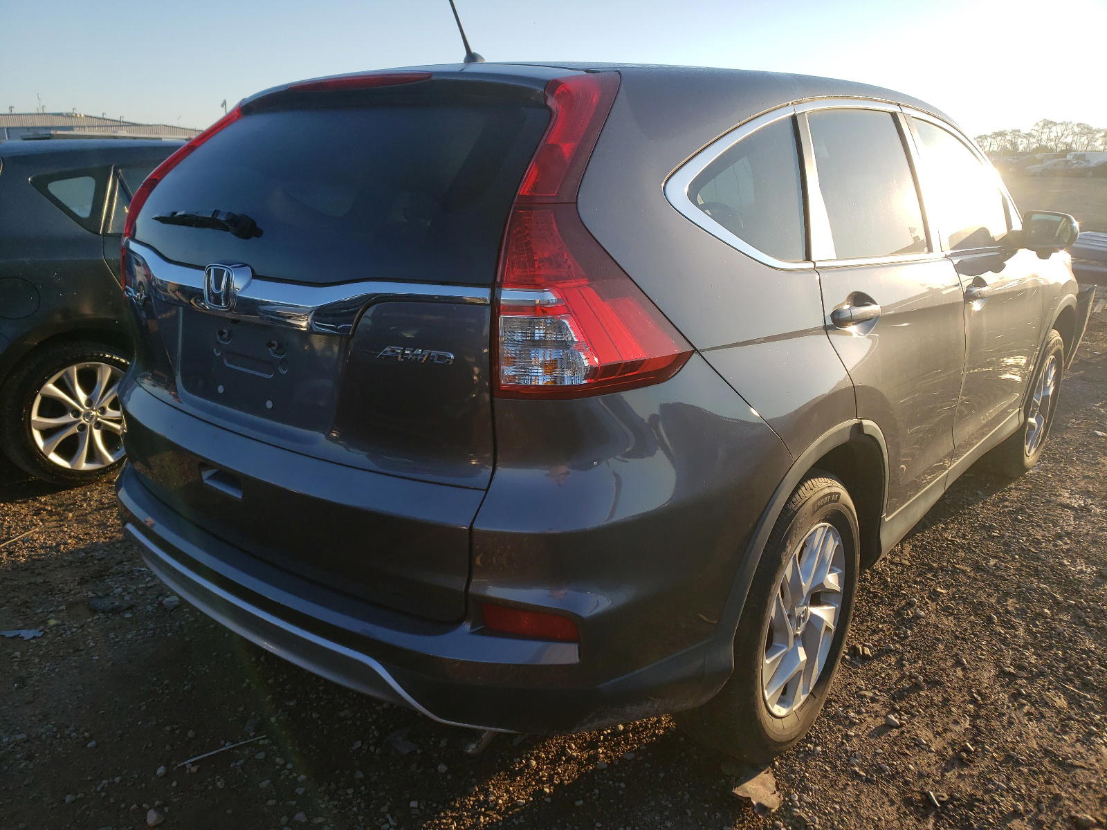 Photo 4 from auction – 2016 HONDA CR-V EX with VIN 2HKRM4H52GH714261