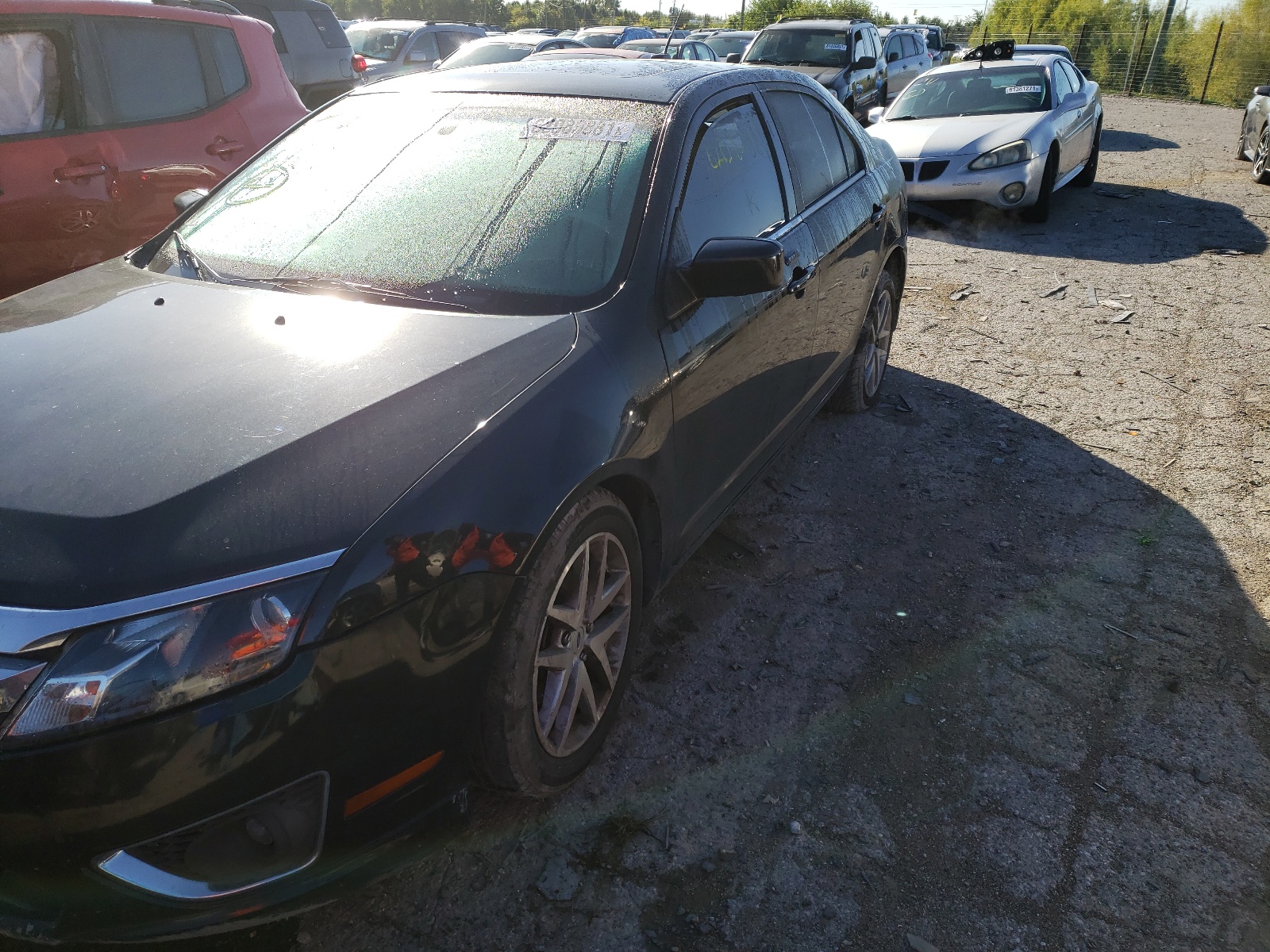 Photo 2 from auction – 2011 FORD FUSION SEL with VIN 3FAHP0JG8BR209103