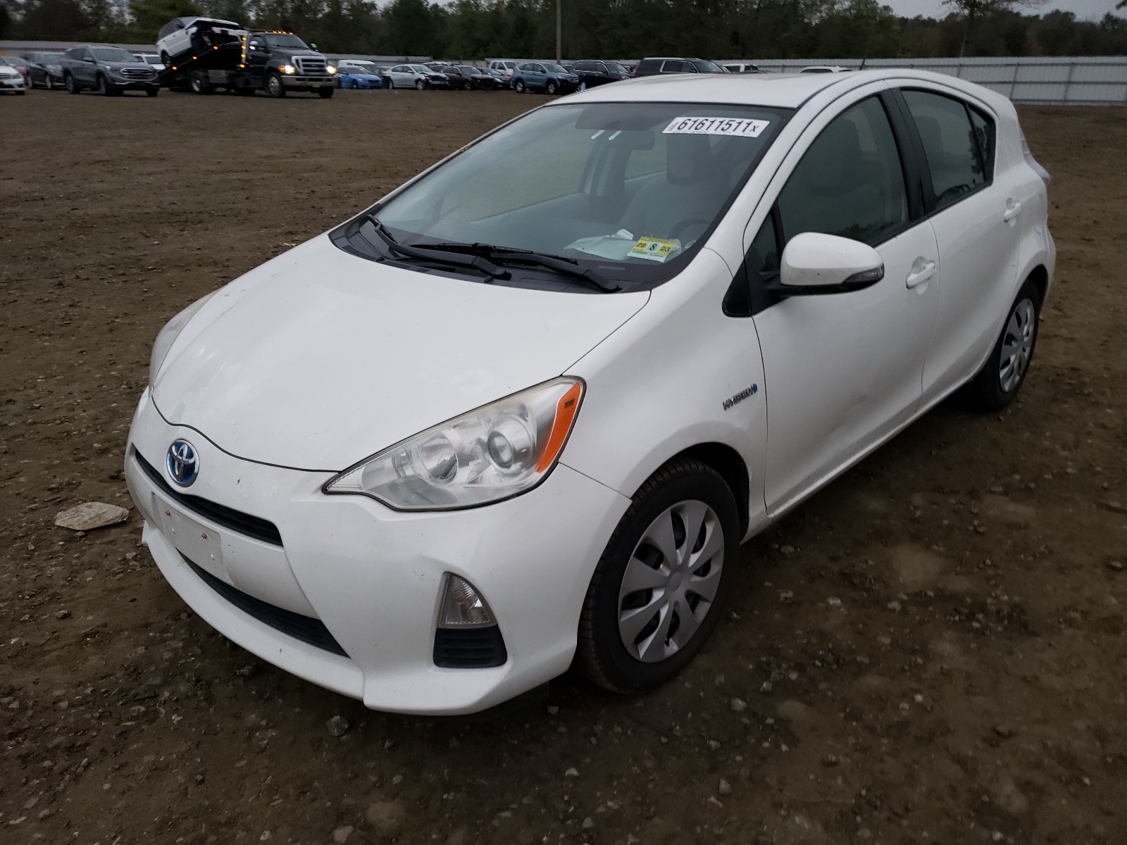 Photo 2 from auction – 2014 TOYOTA PRIUS C with VIN JTDKDTB38E1074466