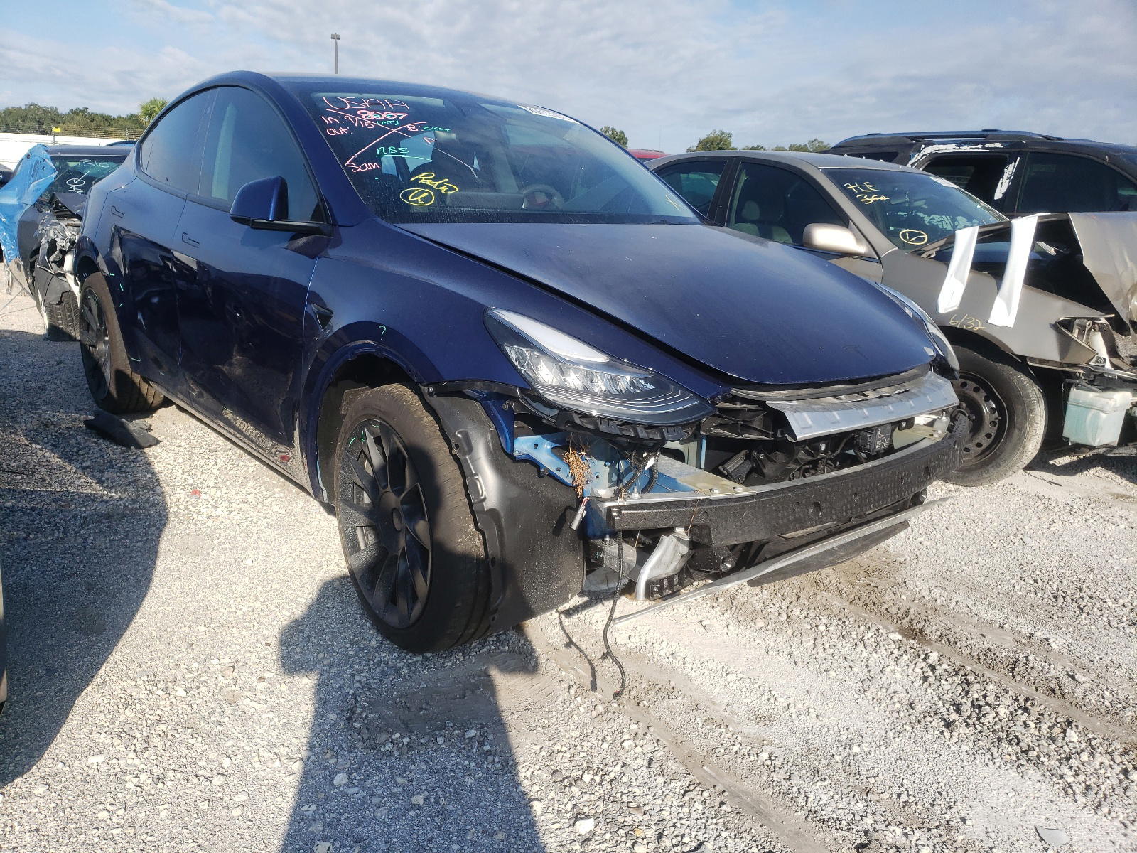 TESLA MODEL Y 2021 with VIN 5YJYGAEEXMF149094 - Photo from auction