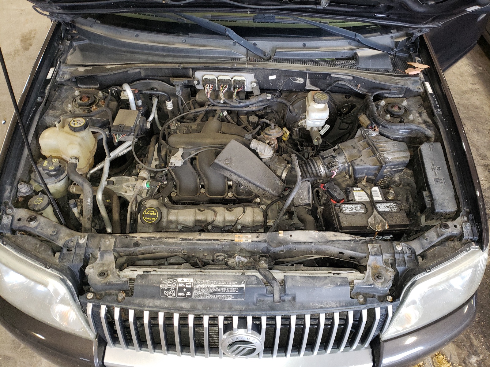 Photo 7 from auction – 2007 MERCURY MARINER PR with VIN 4M2CU97177KJ02814