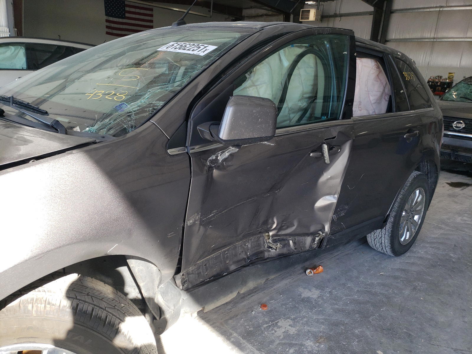 Photo 9 from auction – 2010 FORD EDGE LIMIT with VIN 2FMDK3KC2ABB74328