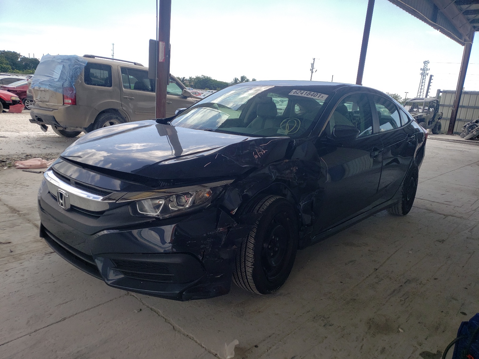 Photo 2 from auction – 2018 HONDA CIVIC LX with VIN 2HGFC2F50JH578923