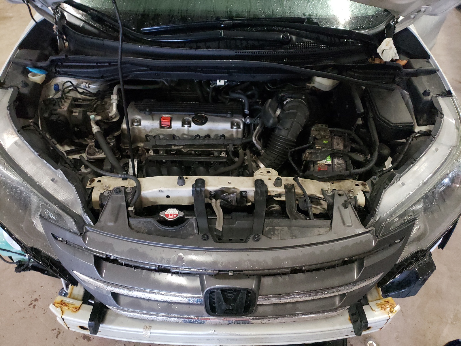 Photo 7 from auction – 2014 HONDA CR-V LX with VIN 5J6RM4H35EL007785