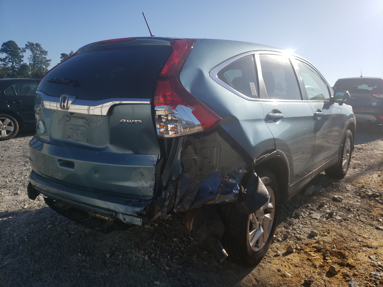 Photo 4 from auction – 2015 HONDA CR-V EX with VIN 5J6RM4H58FL003460
