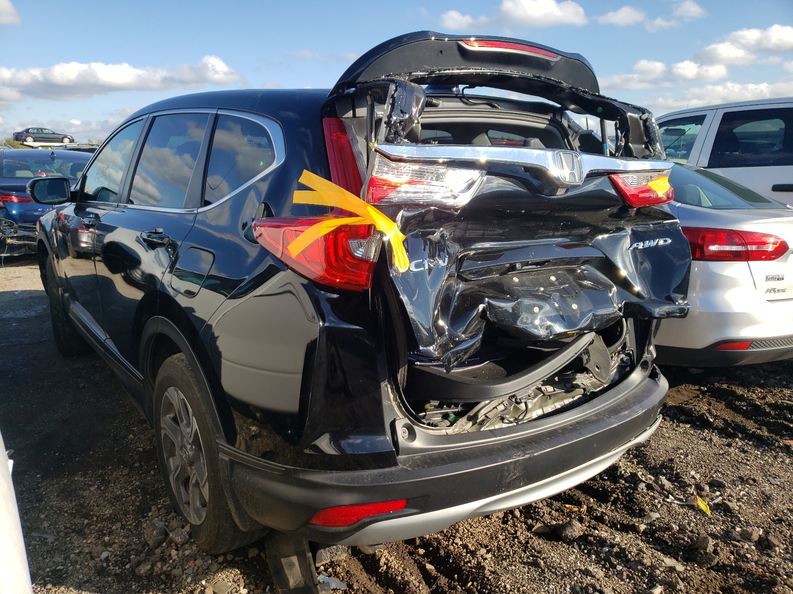 Photo 3 from auction – 2018 HONDA CR-V EX with VIN 7FARW2H54JE030479