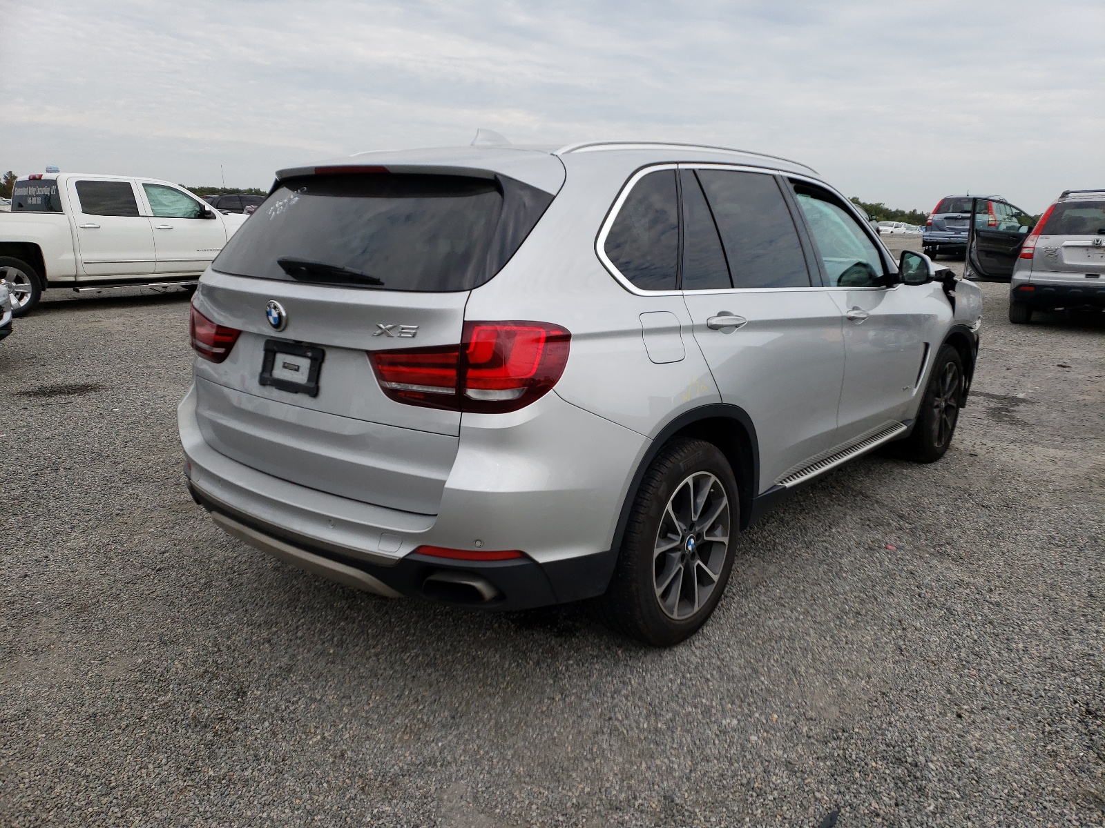 Photo 4 from auction – 2014 BMW X5 XDRIVE5 with VIN 5UXKR6C59E0J72042