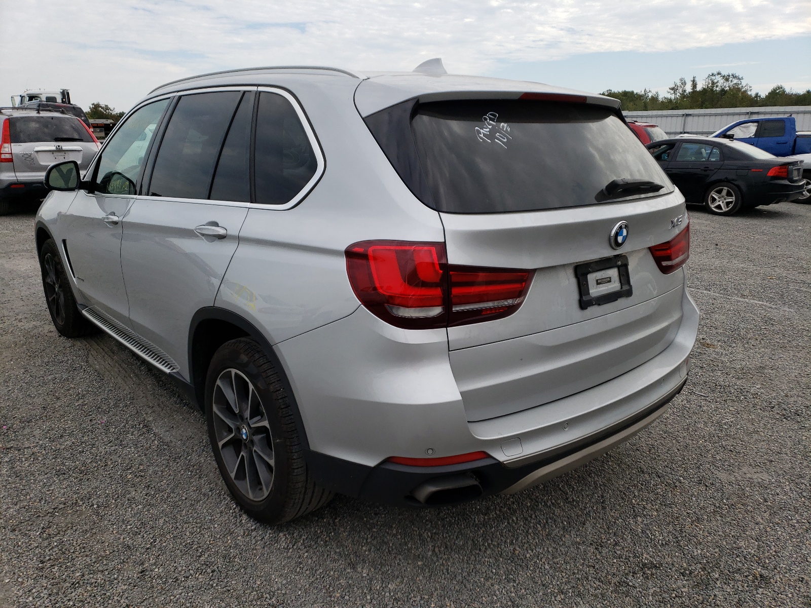 Photo 3 from auction – 2014 BMW X5 XDRIVE5 with VIN 5UXKR6C59E0J72042
