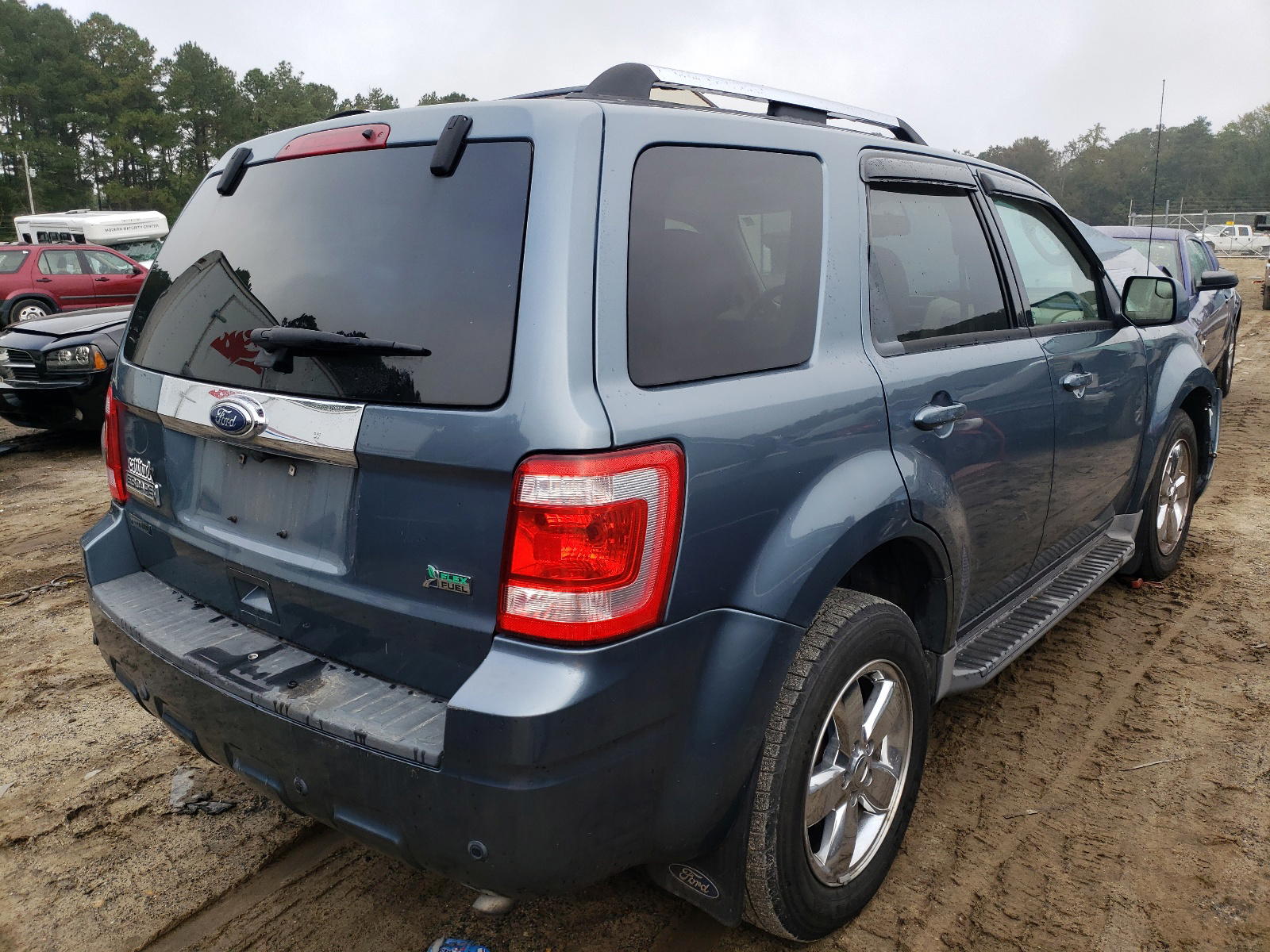 Photo 4 from auction – 2010 FORD ESCAPE LIM with VIN 1FMCU0EG2AKC15548
