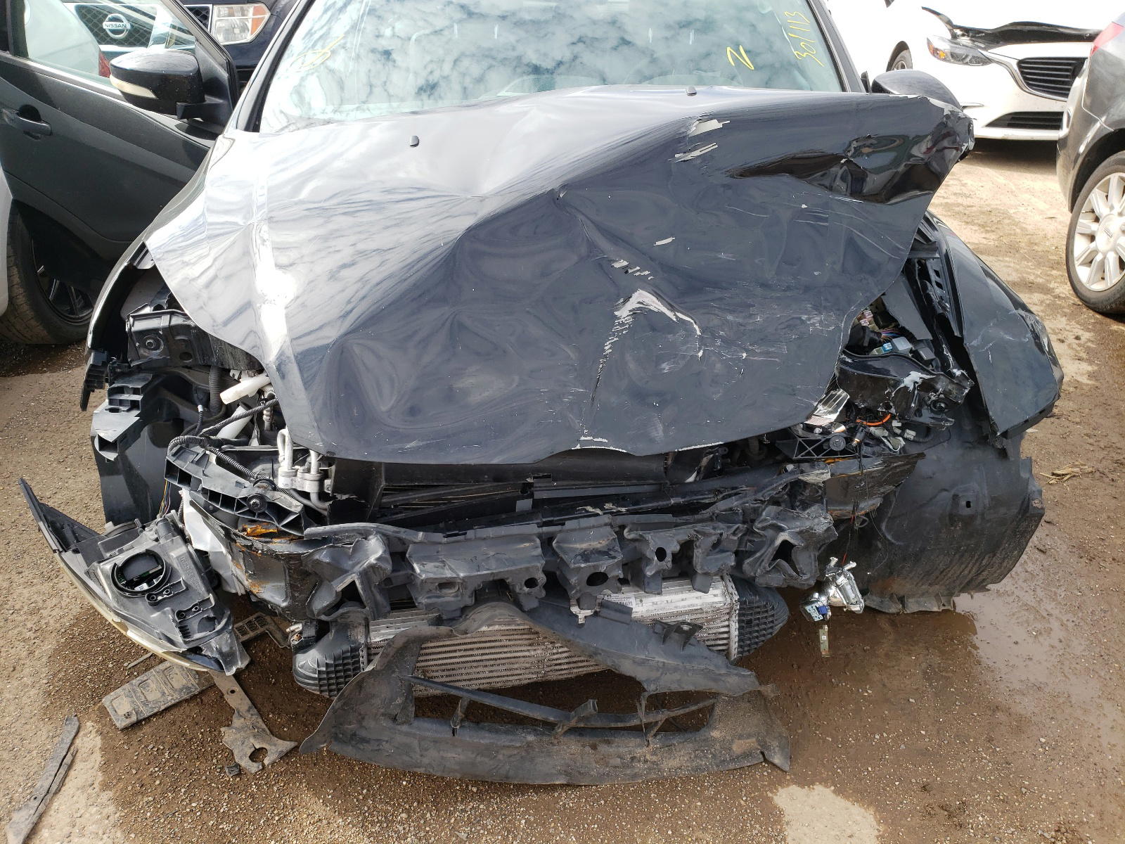 Photo 9 from auction – 2013 FORD FOCUS with VIN 1FADP3L90DL301113