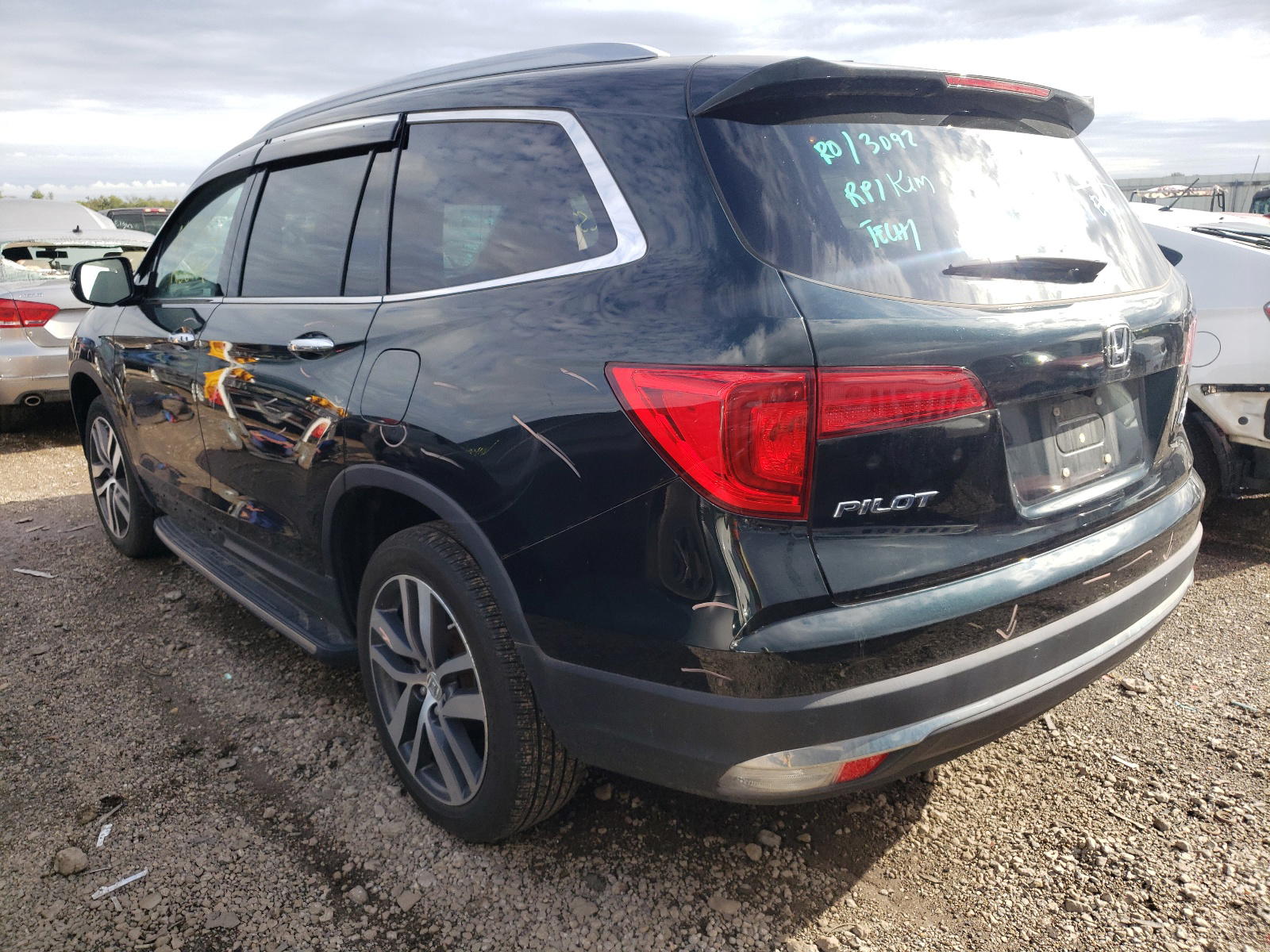 Photo 3 from auction – 2017 HONDA PILOT ELIT with VIN 5FNYF6H09HB101155